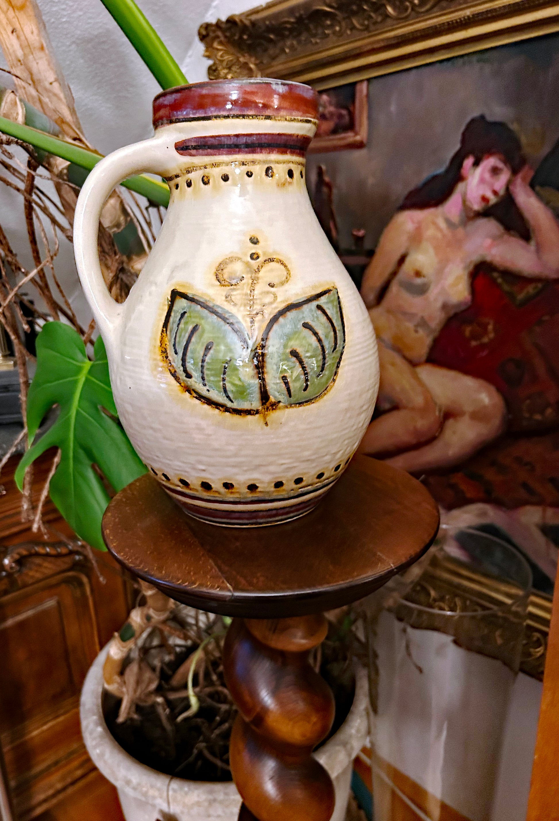 Vintage German ceramic jug detail of hand-painted green leaf motif