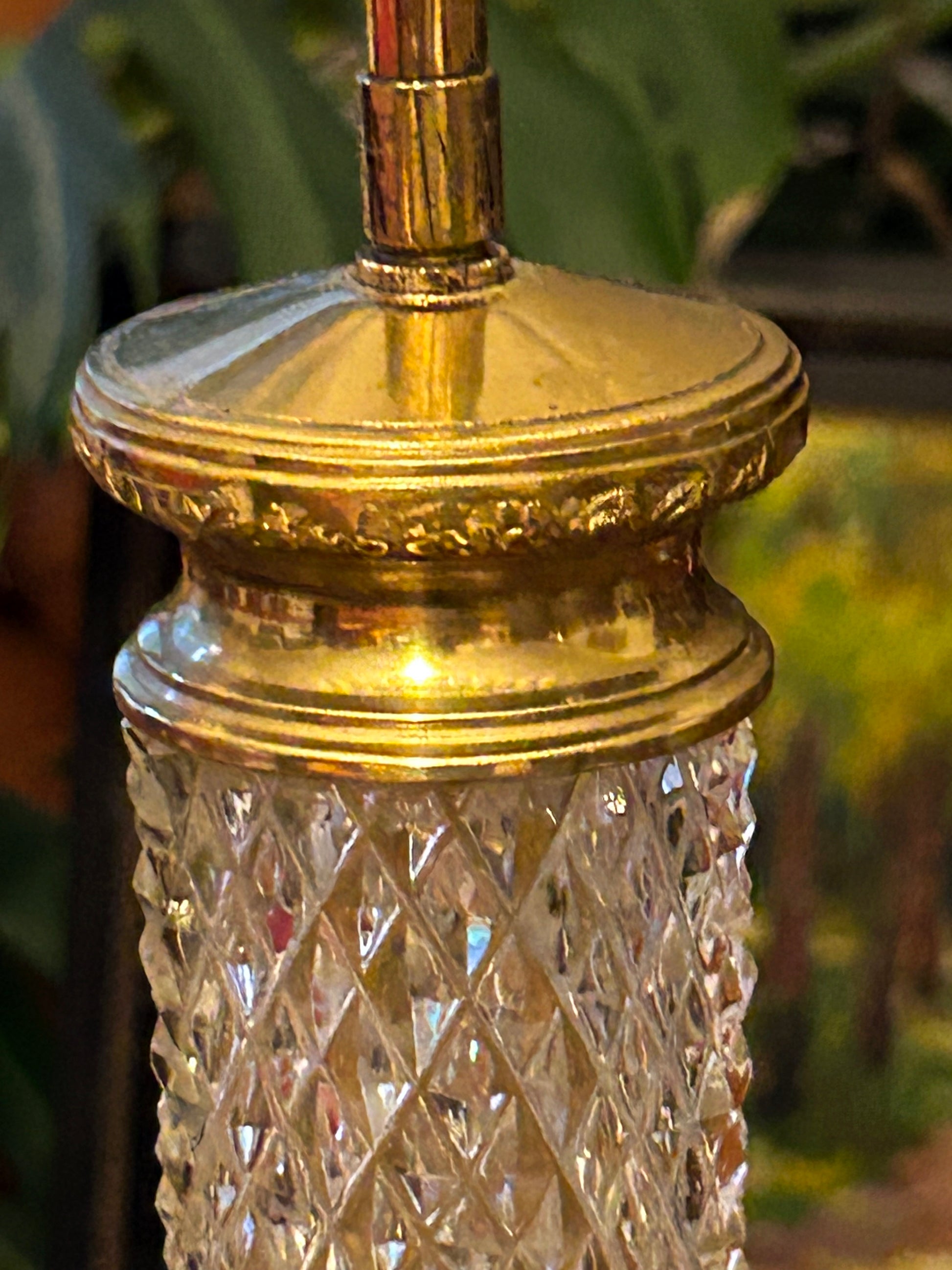 Chased gilt brass collar detail at the top of the crystal column