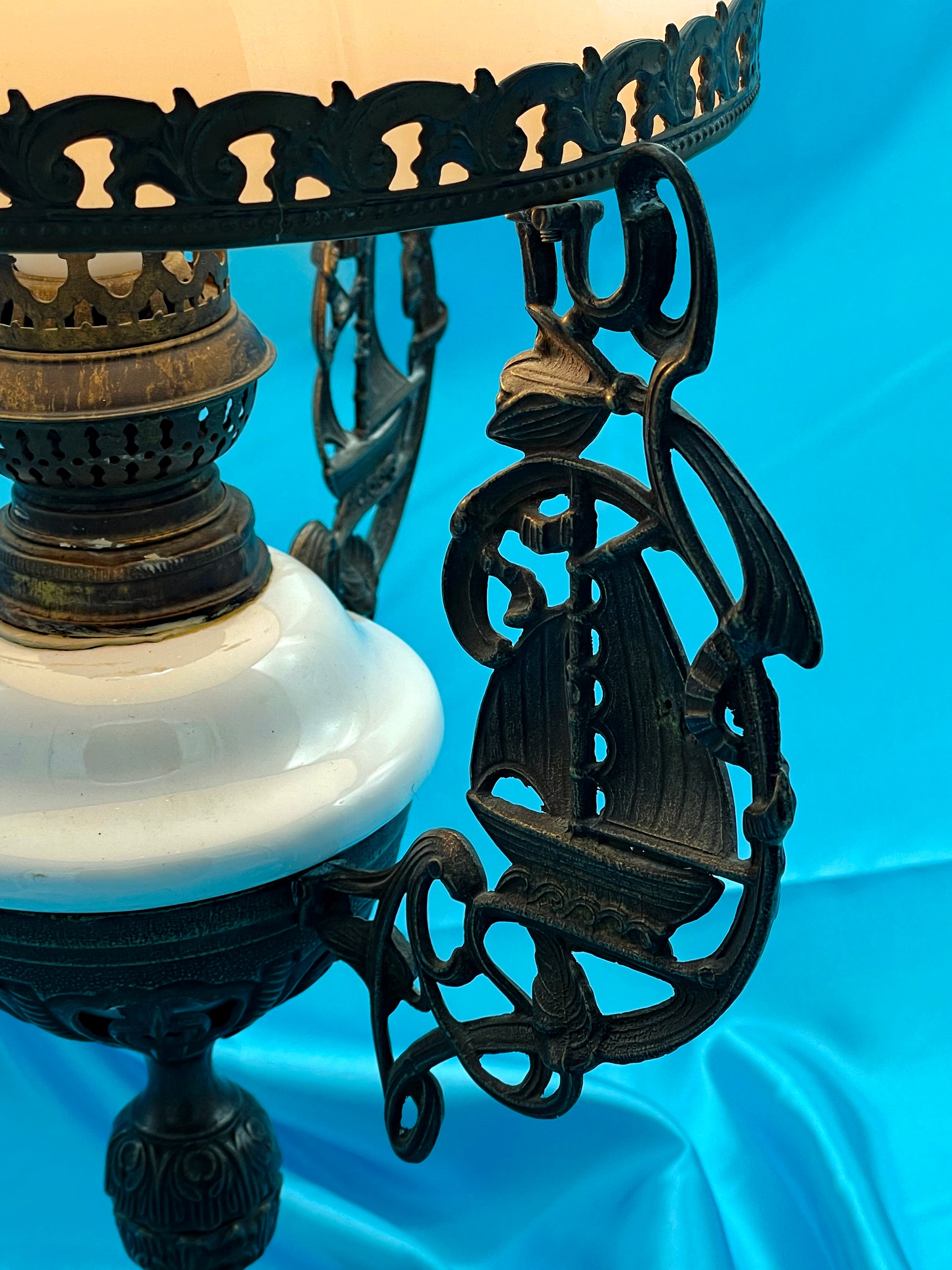 White porcelain reservoir and bronze pedestal detail