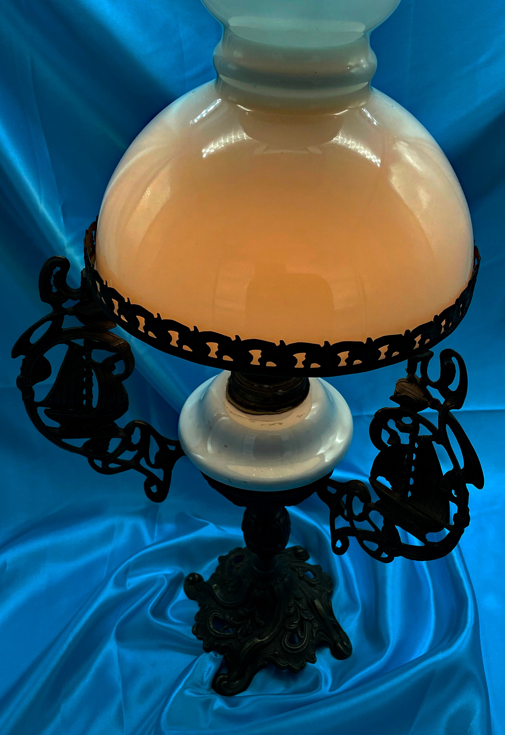 Antique North German electrified petroleum lamp with bronze base and opaline shade