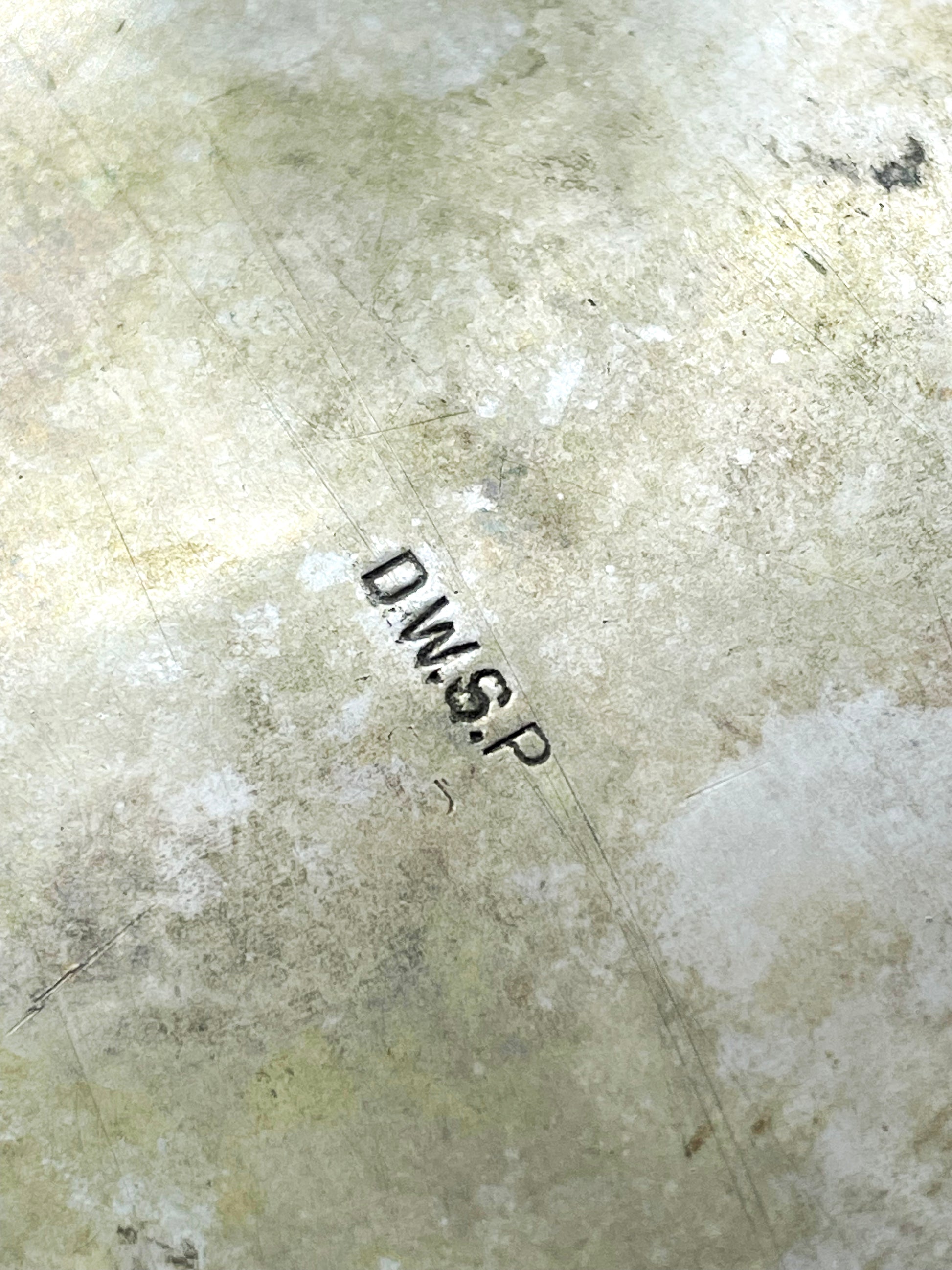 Maker's mark D.W.S.P stamped on the base of the silver plated cooler