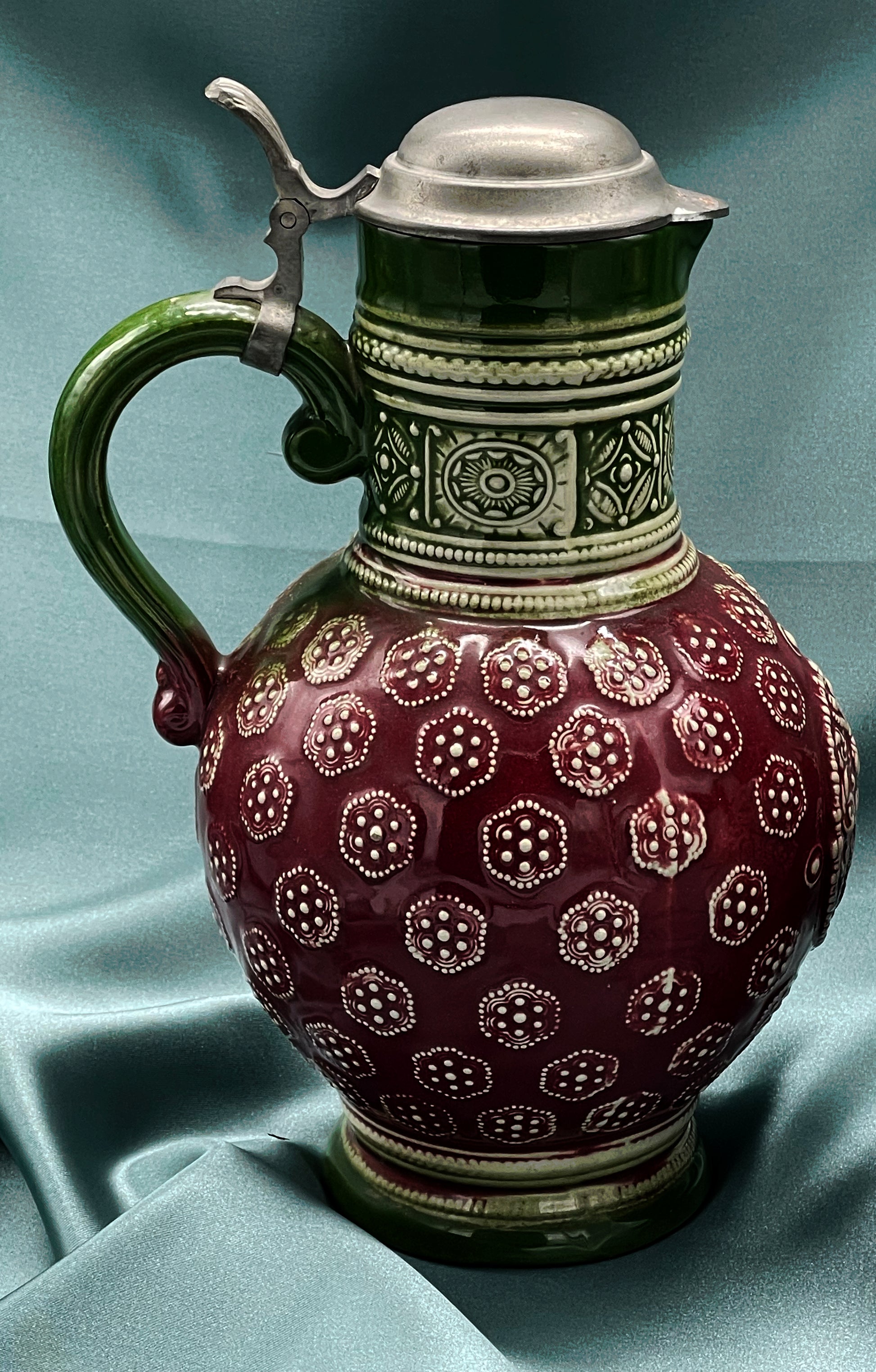 Westerwald Noppenkrug detail of raised knob relief and burgundy glaze