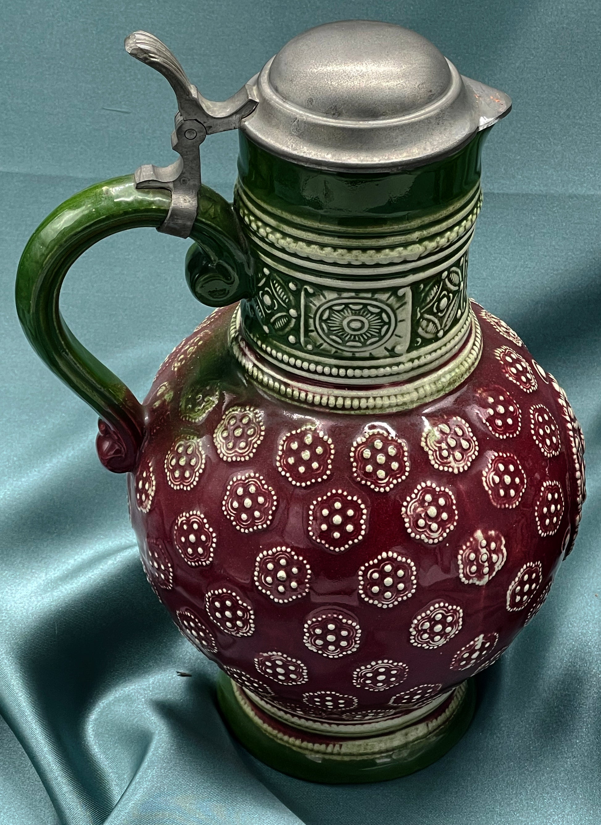 Pair of German stoneware jugs, side angle
