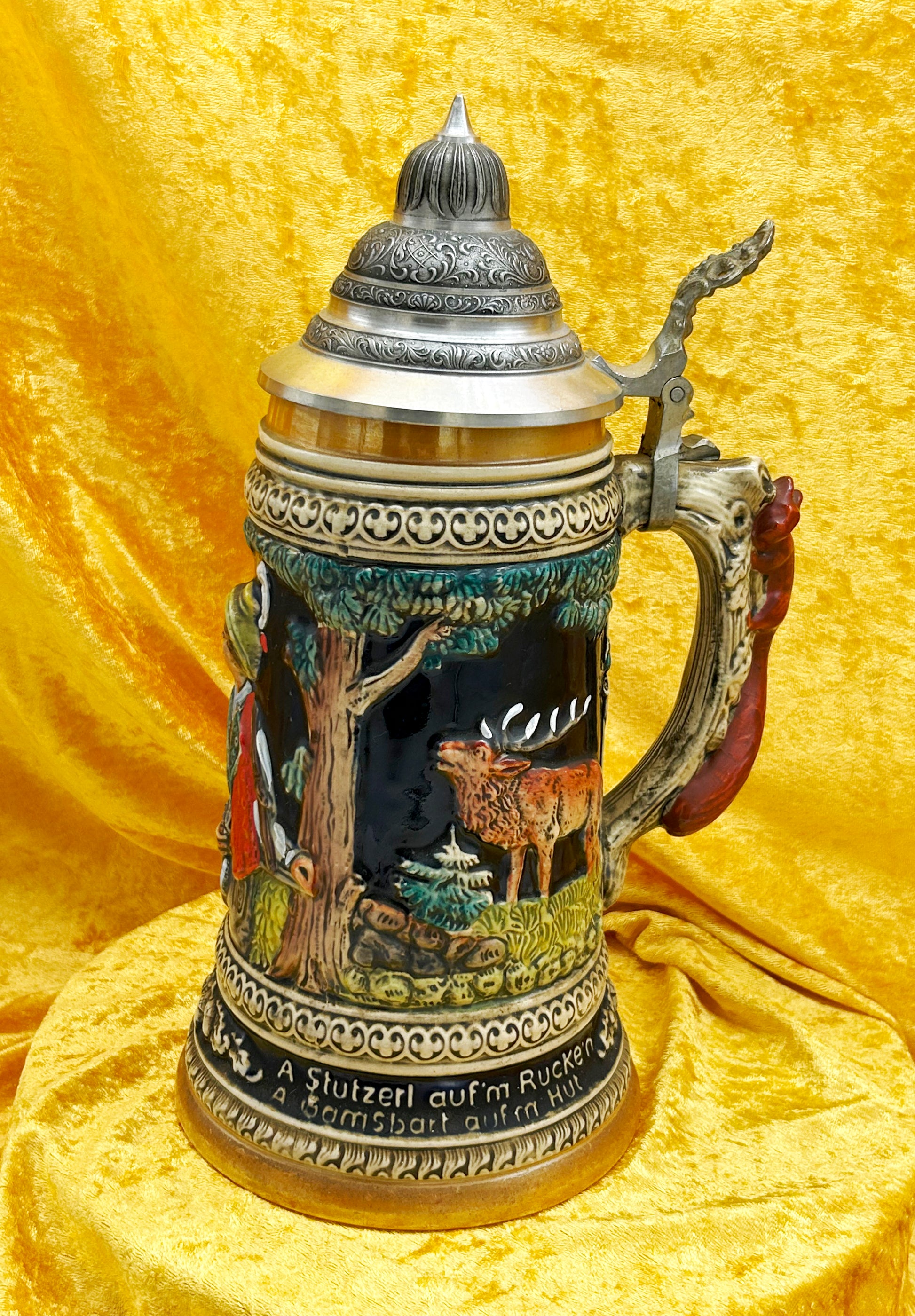 XXL German relief beer stein 35 cm with ornate pewter lid open, hand-painted Bavarian hunting scene, full three-quarter view