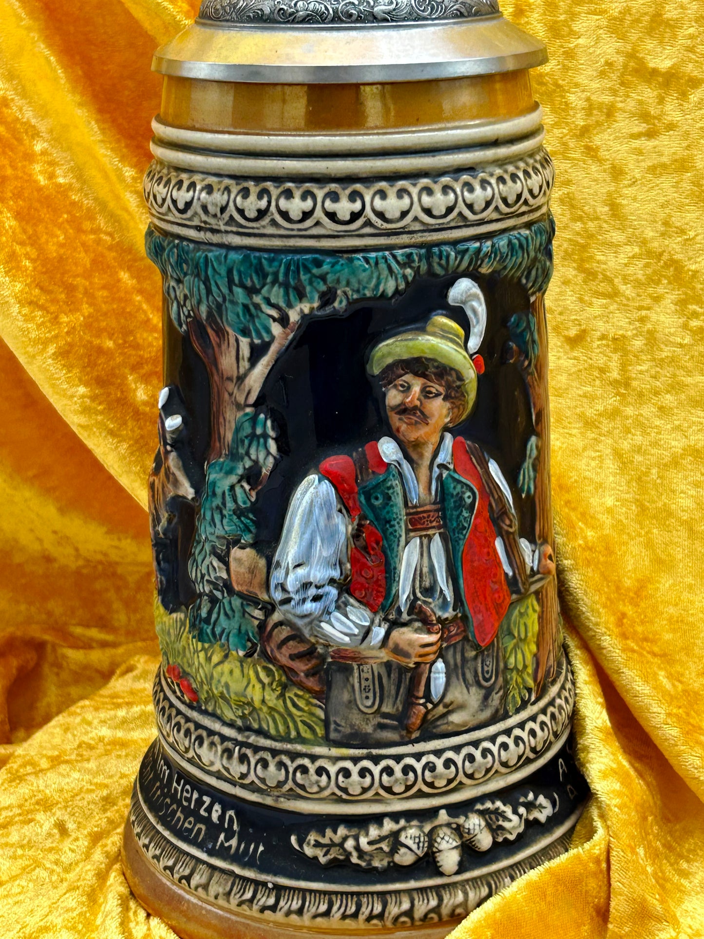 Close-up relief detail of a hunting figure in folk costume