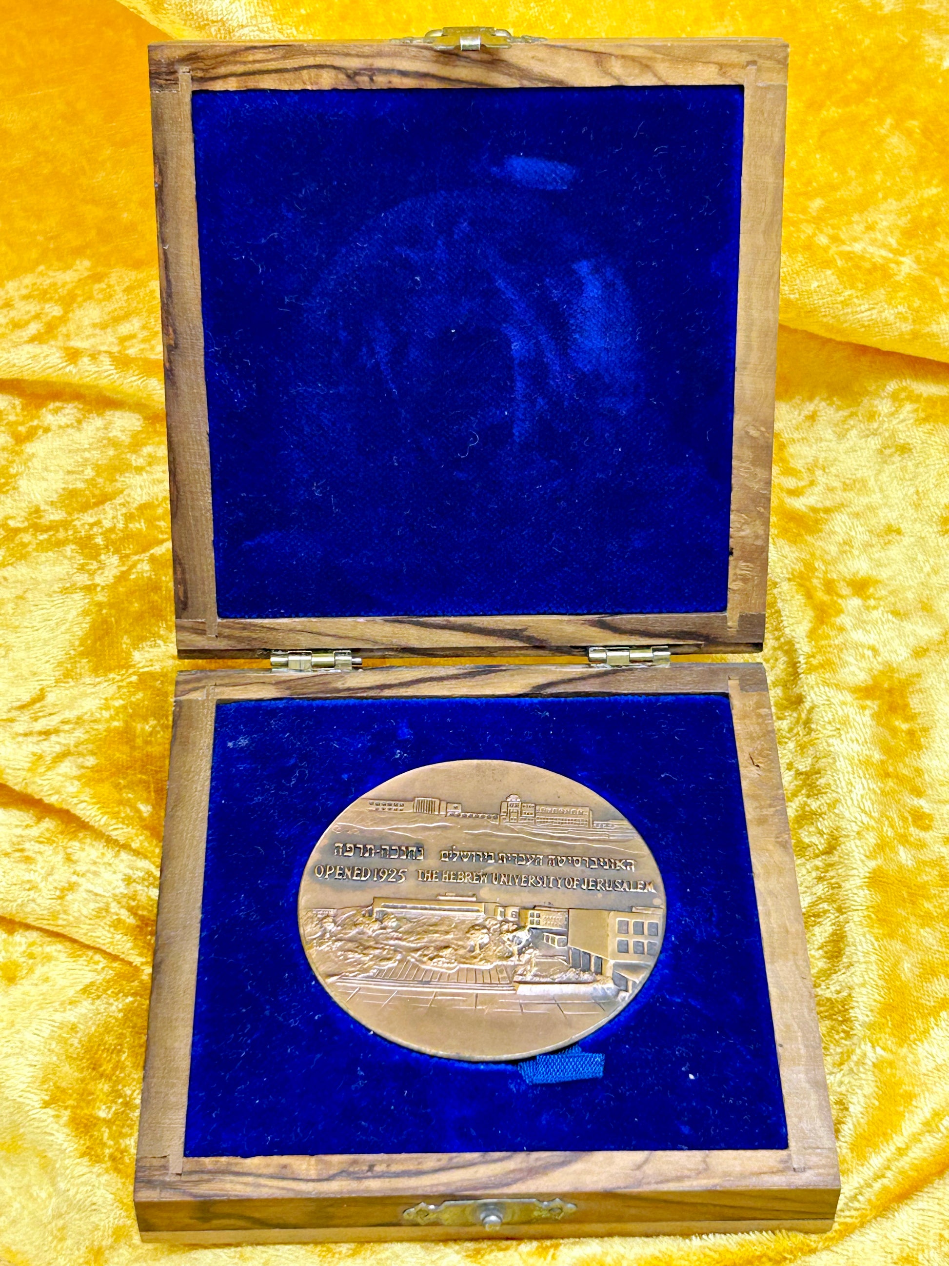 Hebrew University Jerusalem commemorative bronze medal displayed in its olive-wood box, angled view