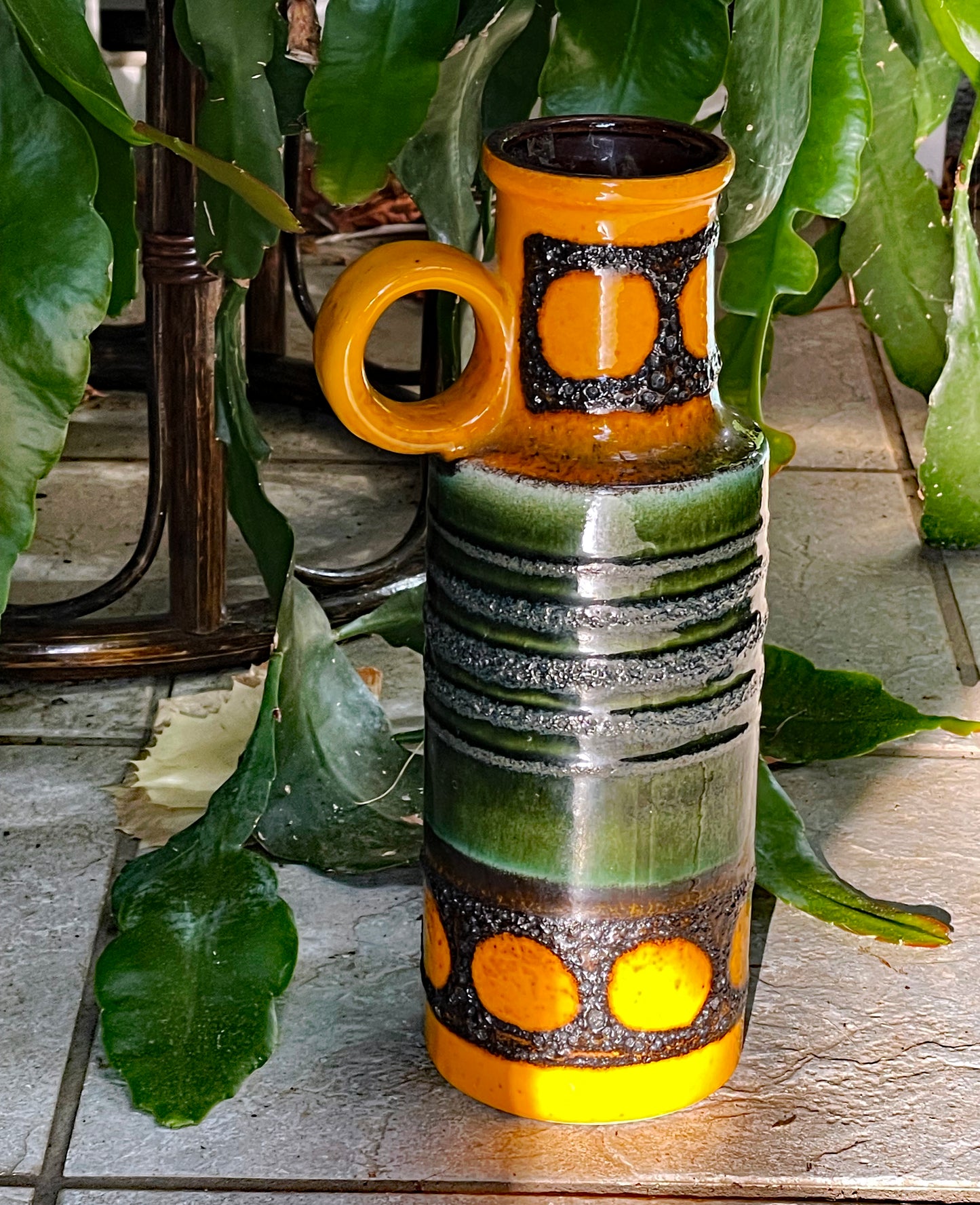 Vintage West German Fat Lava vase shown full length in context