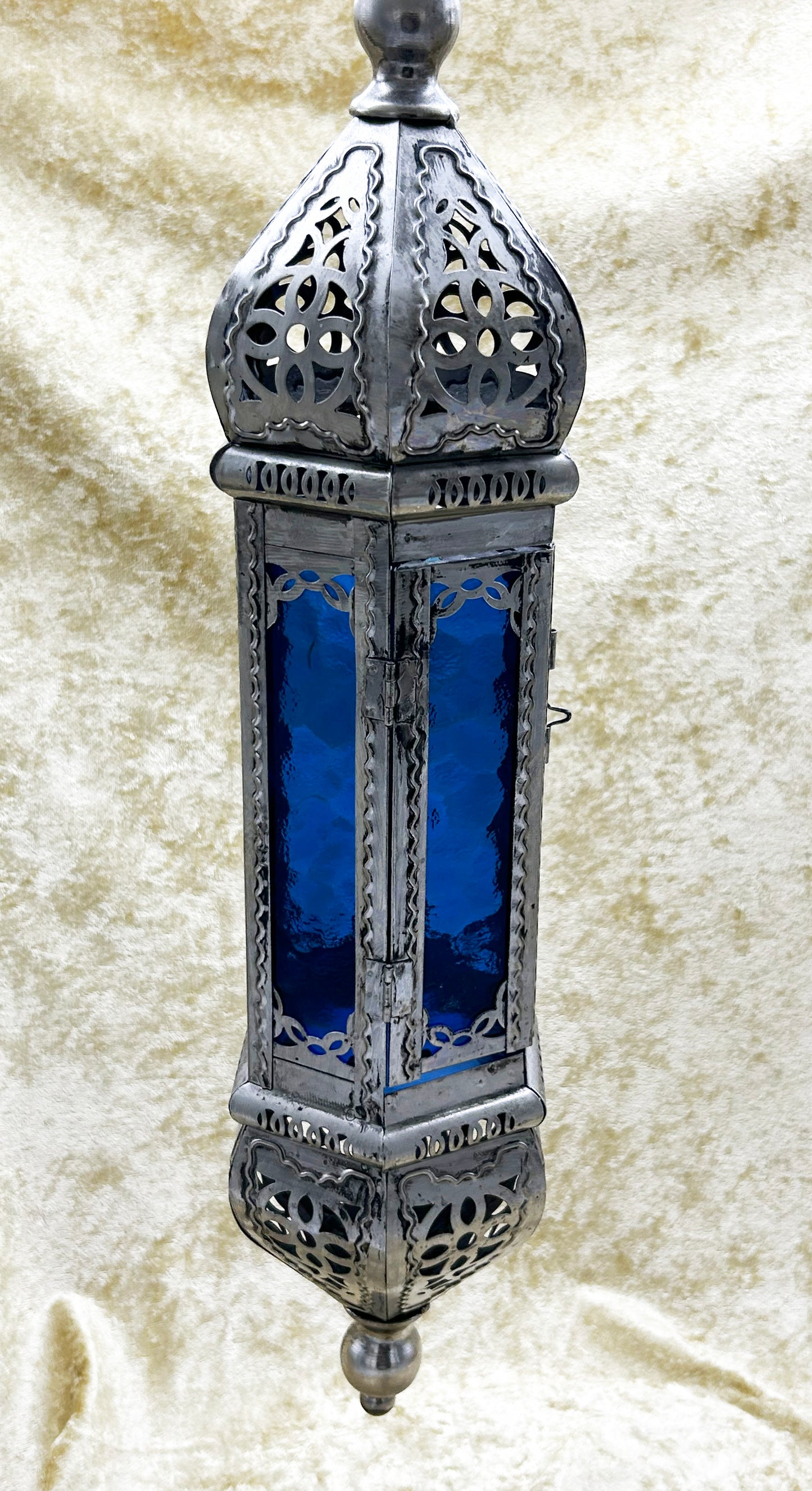 Oriental tealight lantern, full side view showing domed crown and finial