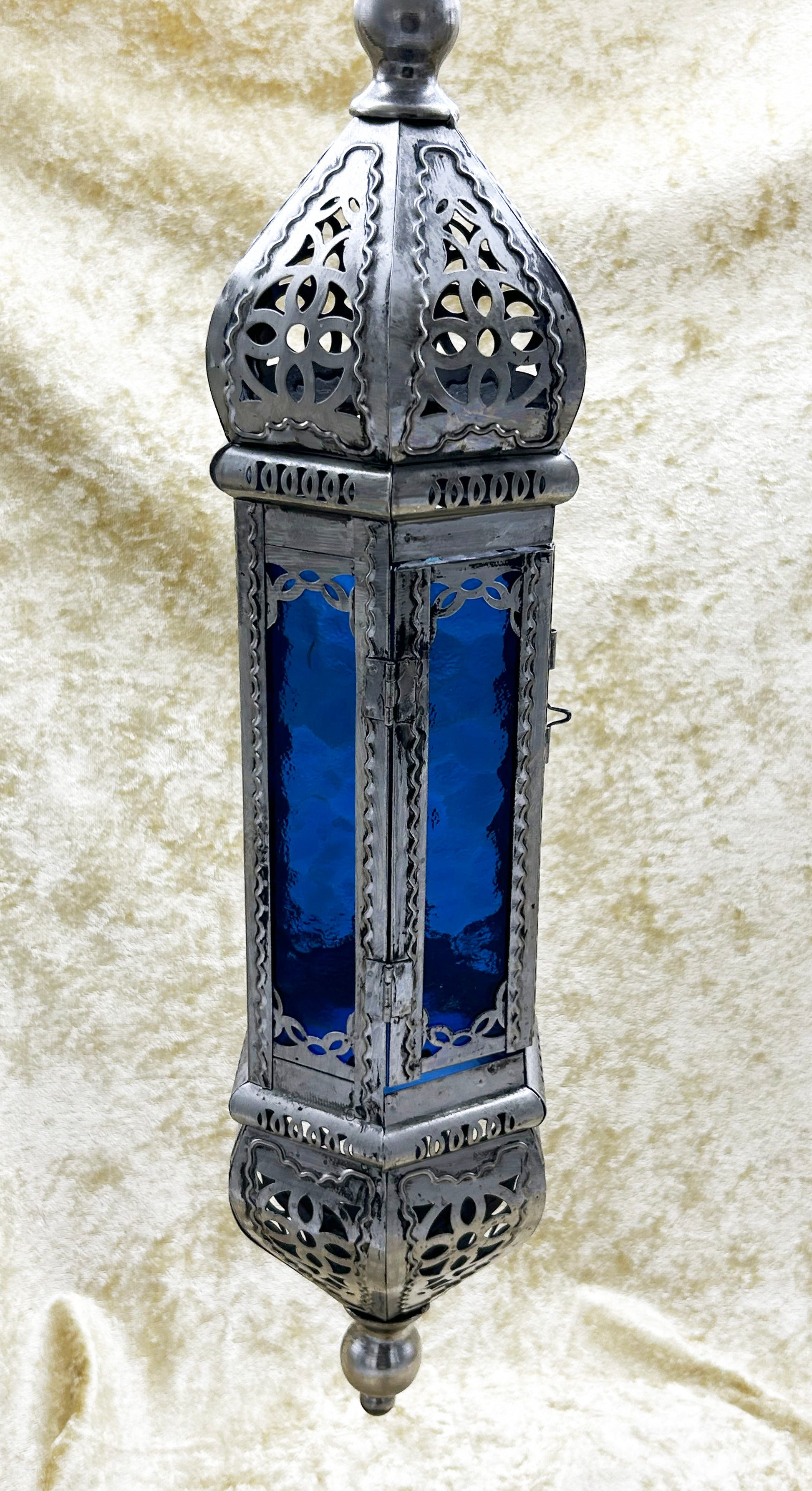 Oriental tealight lantern, full side view showing domed crown and finial