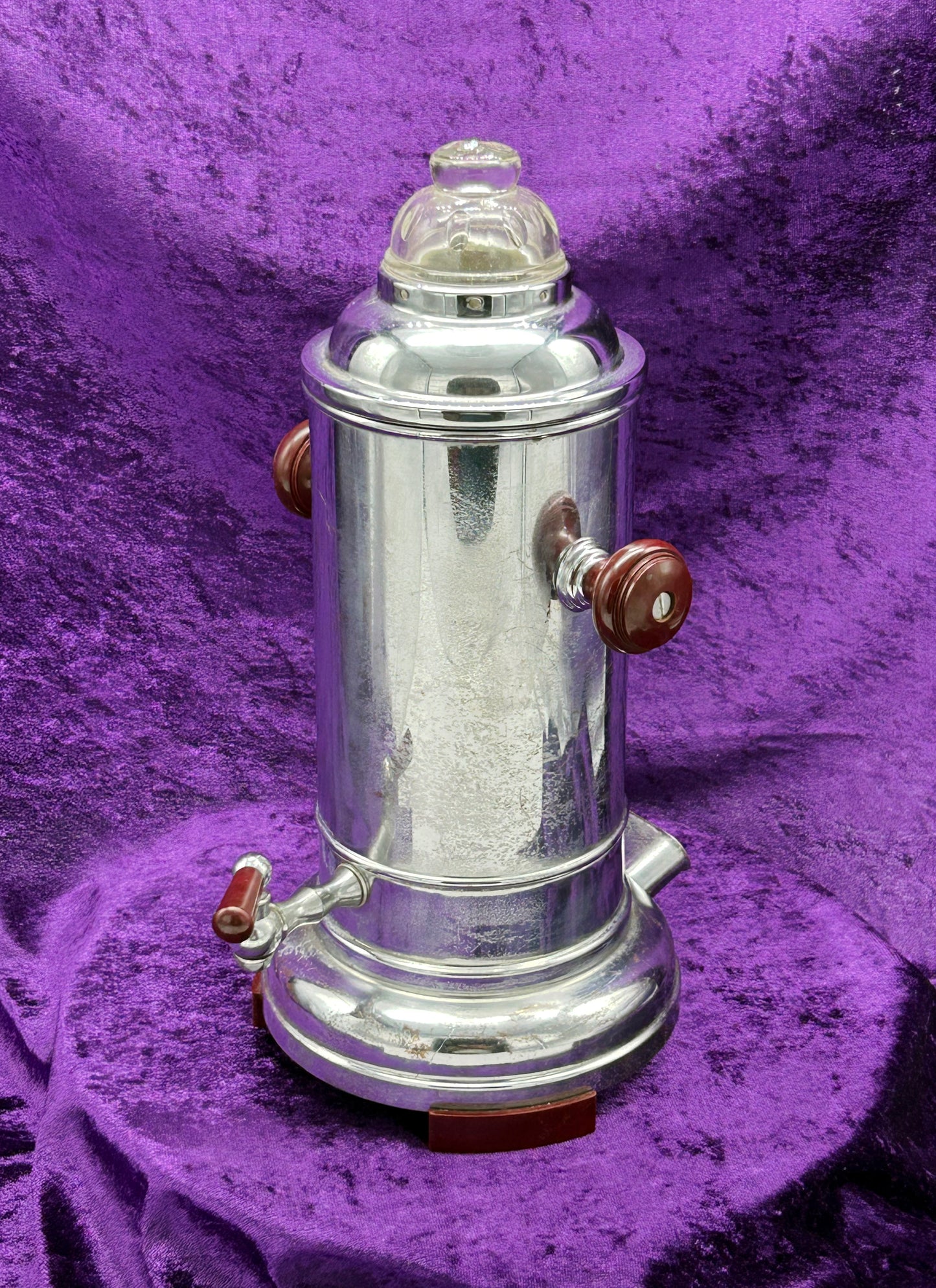 Vintage DDR chrome electric coffee percolator with bakelite handles and glass dome, three-quarter view