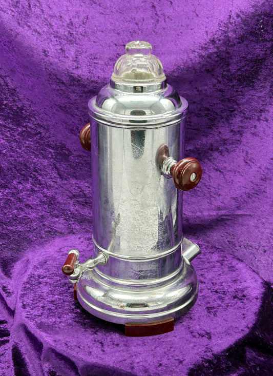 Vintage DDR chrome electric coffee percolator with bakelite handles and glass dome, three-quarter view