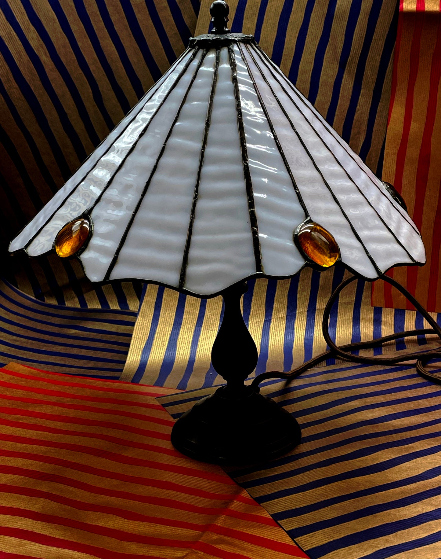 Berliner Art Déco bronze table lamp with white slag glass shade and amber jewels