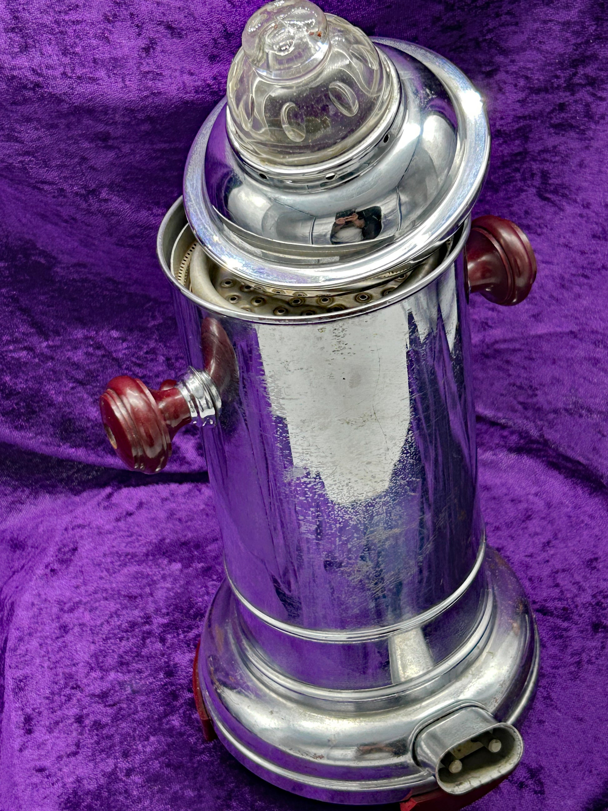 Top-down detail of DDR coffee percolator showing perforated insert and base electrical socket