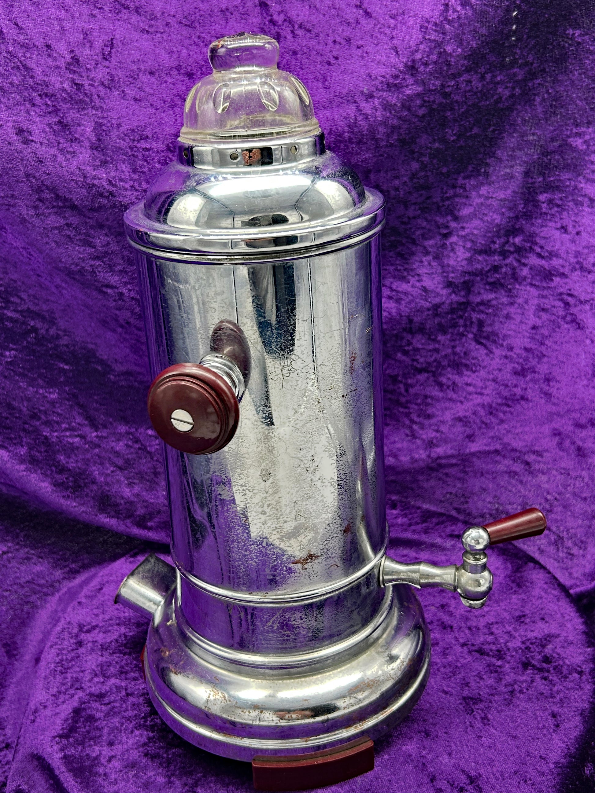 East German chrome coffee percolator showing bakelite knob and tap lever, front view