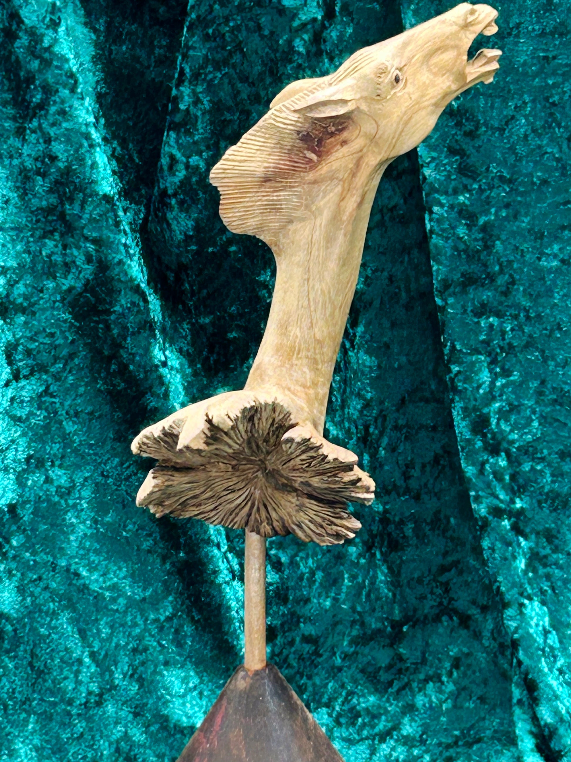 Detail of the carved root burst element at the neck of the horse sculpture
