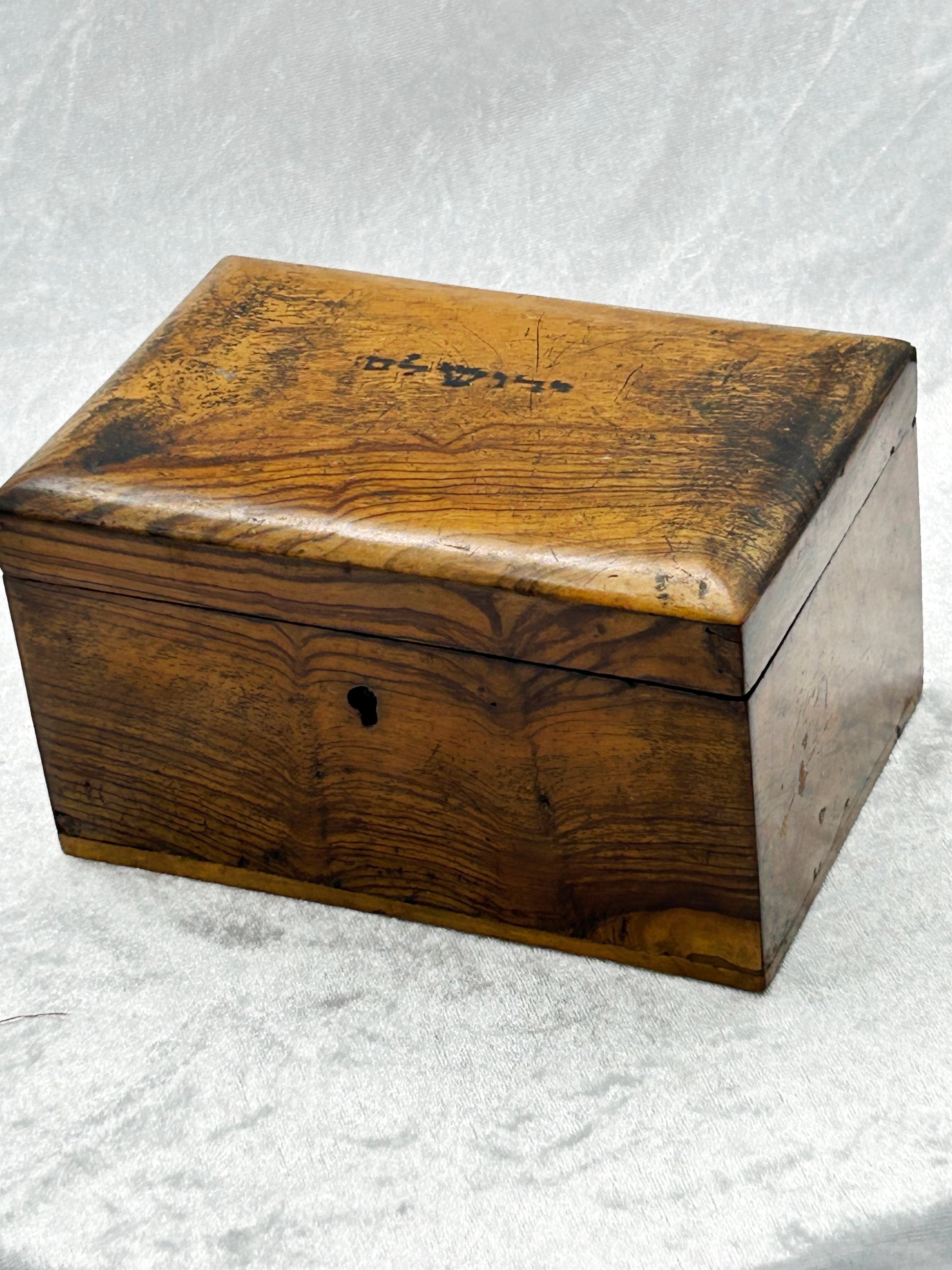 Antique Hebrew-inscribed olive wood box, front and side view with keyhole escutcheon