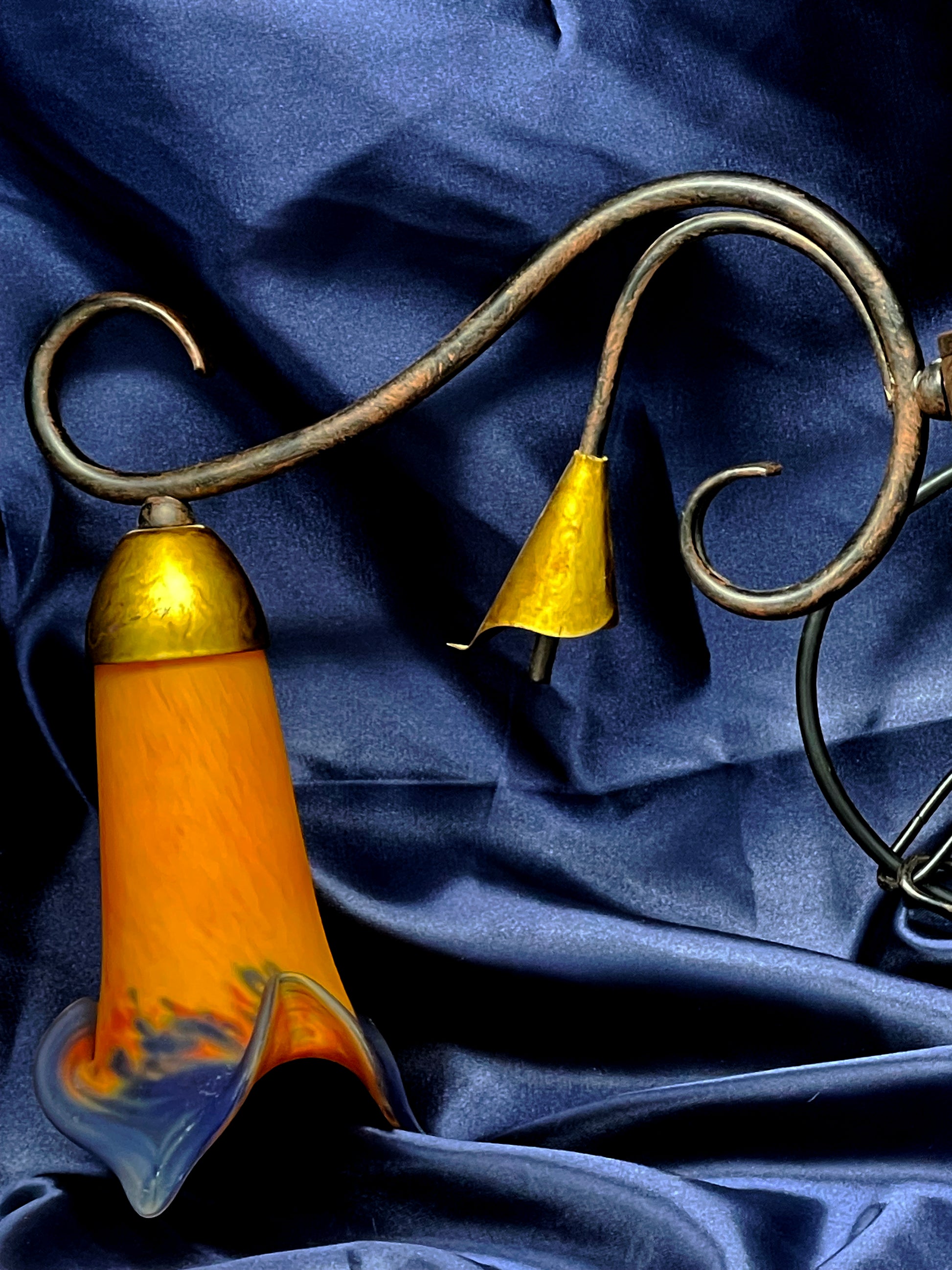 Two glowing tulip shades on French pendant lamp