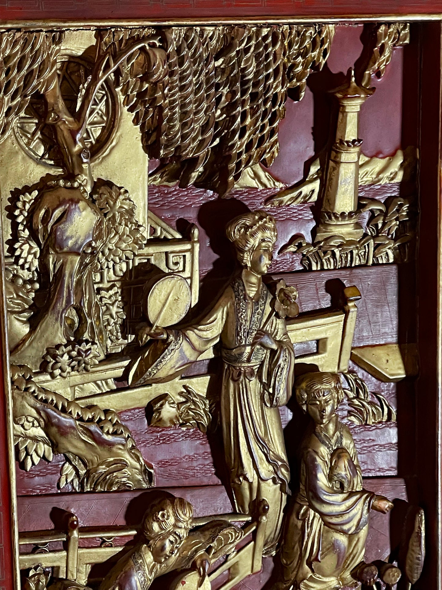 Close-up of gilded relief carving on Chinese lacquer panel