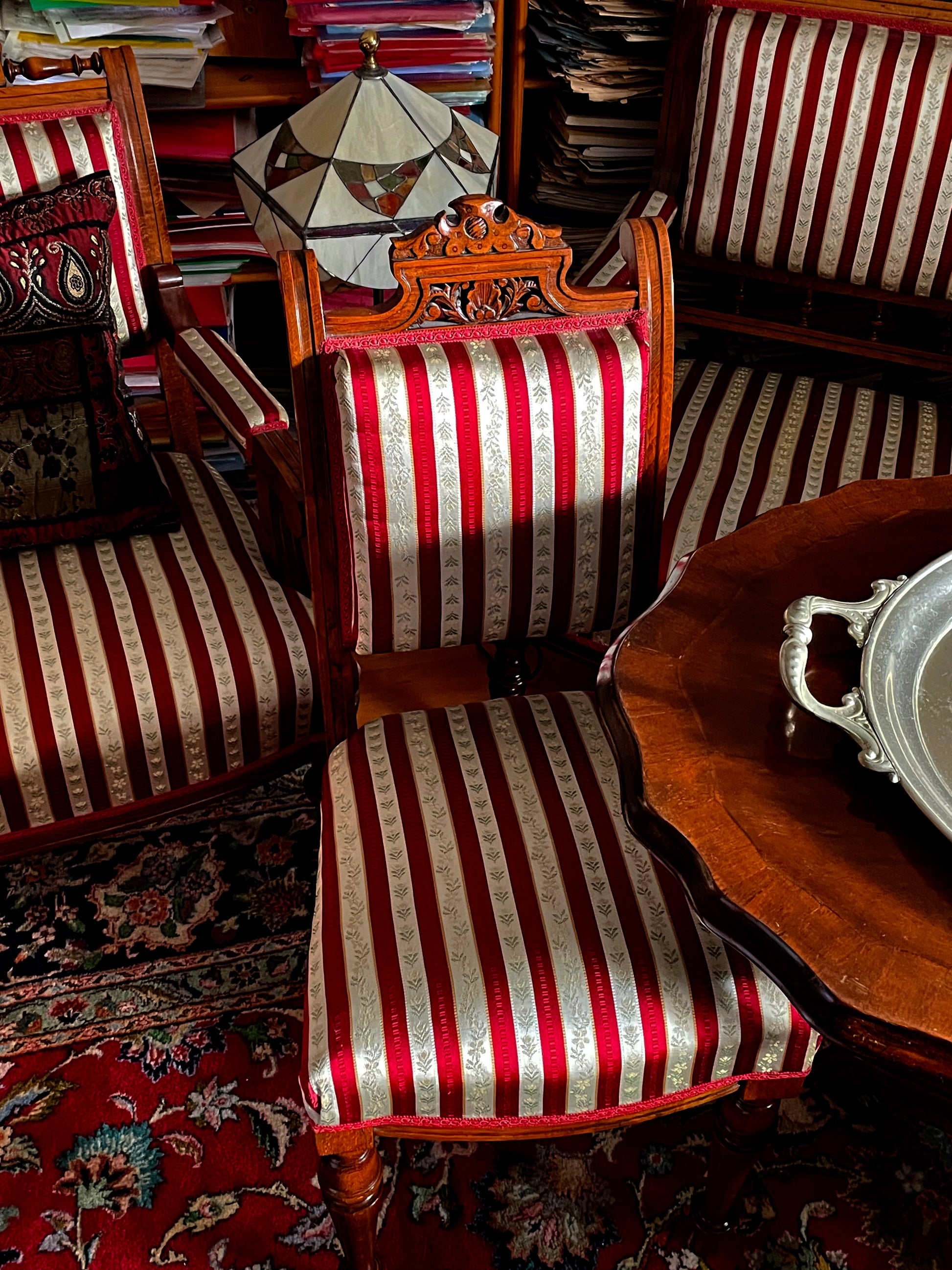Biedermeier settee and side chair with carved walnut crest rail detail