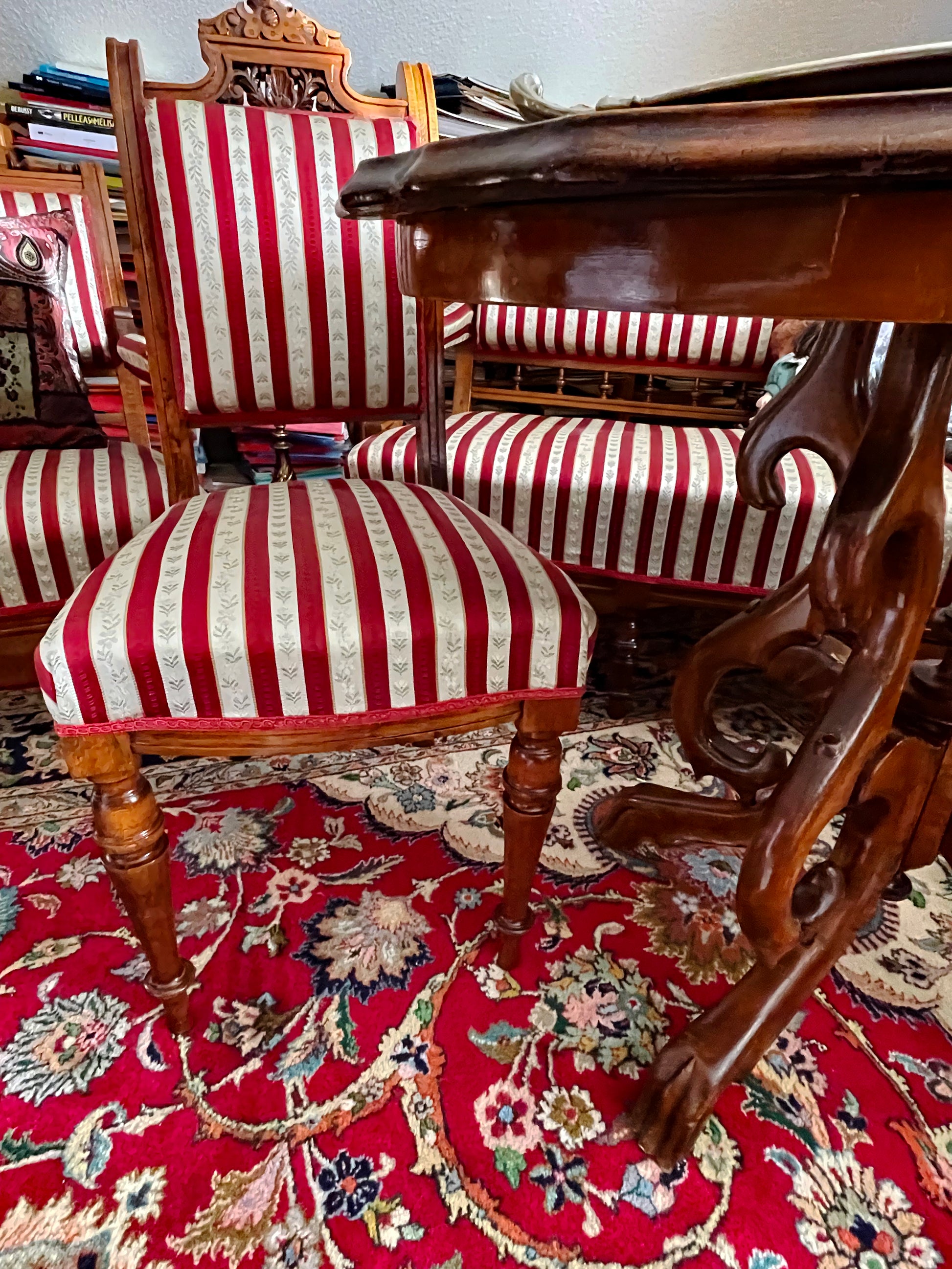 Biedermeier side chair three-quarter view showing stripe upholstery and walnut frame