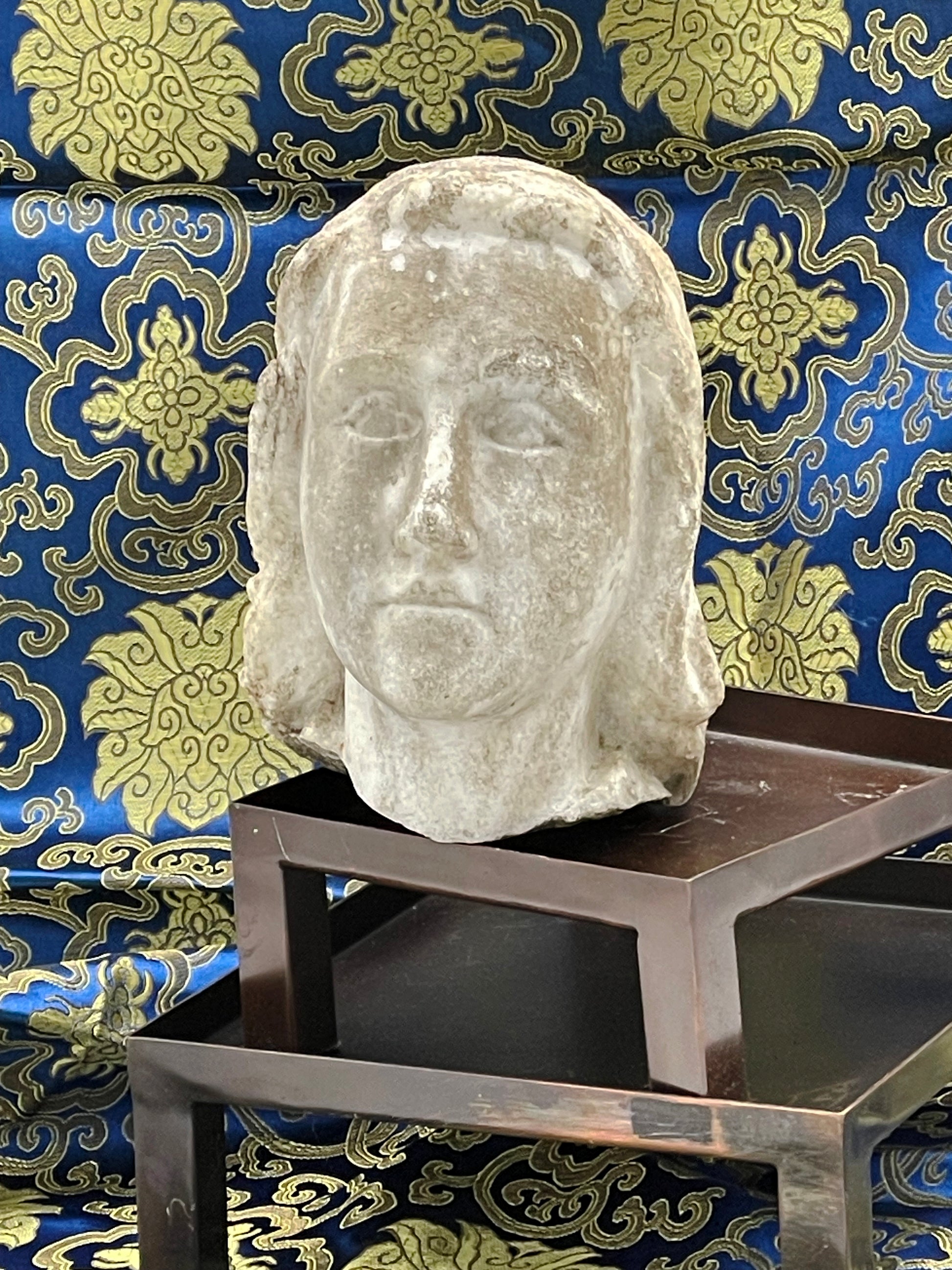 Three quarter view of French marble cherub head
