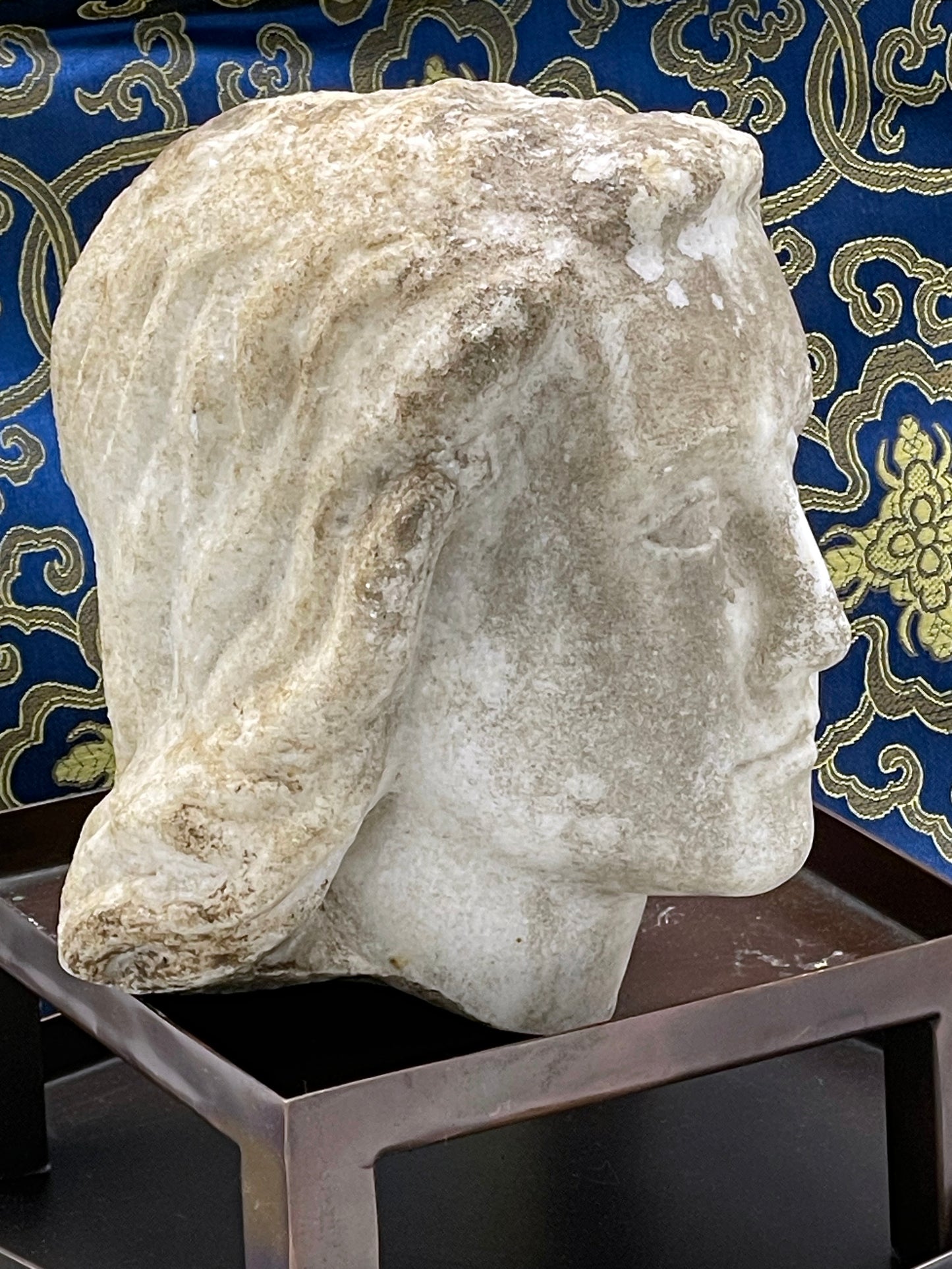 Rear view of marble angel head sculpture