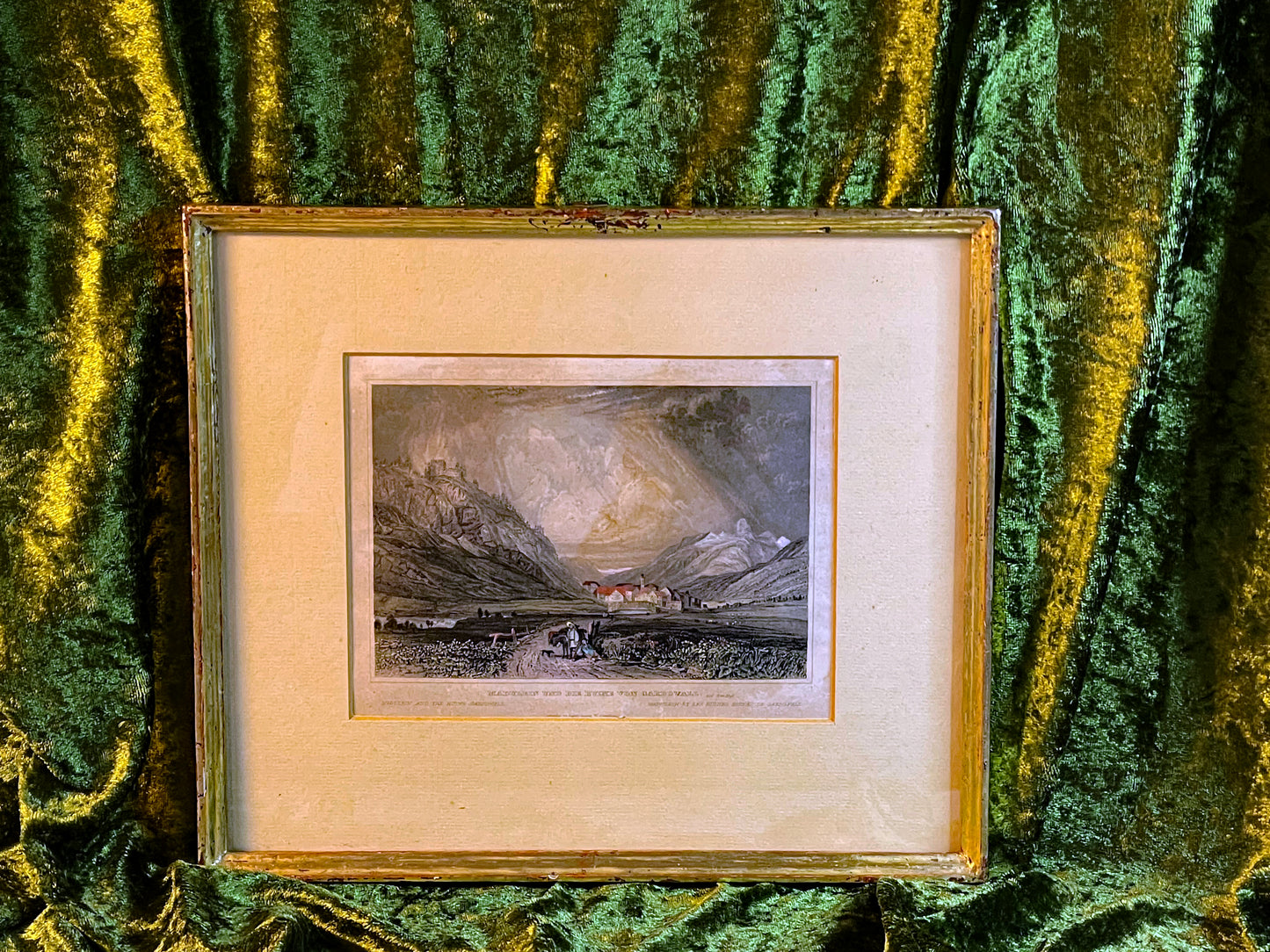 Framed 19th century Swiss Engadine engraving on green velvet backdrop