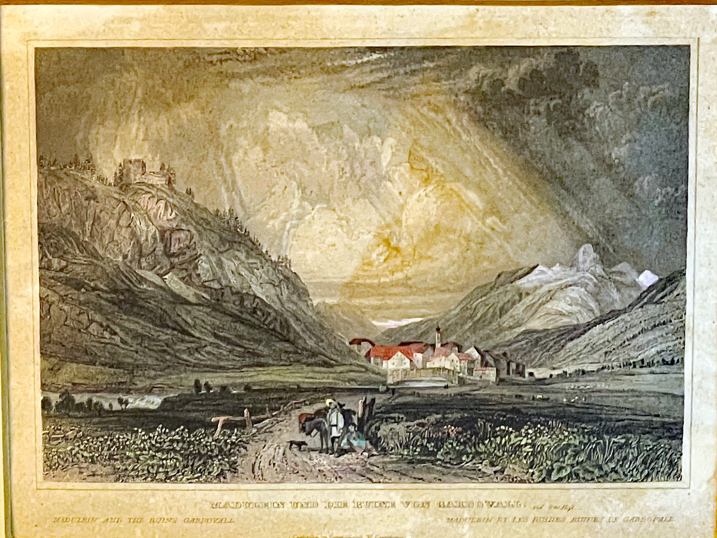 Close view of the gilded frame and cream passepartout
