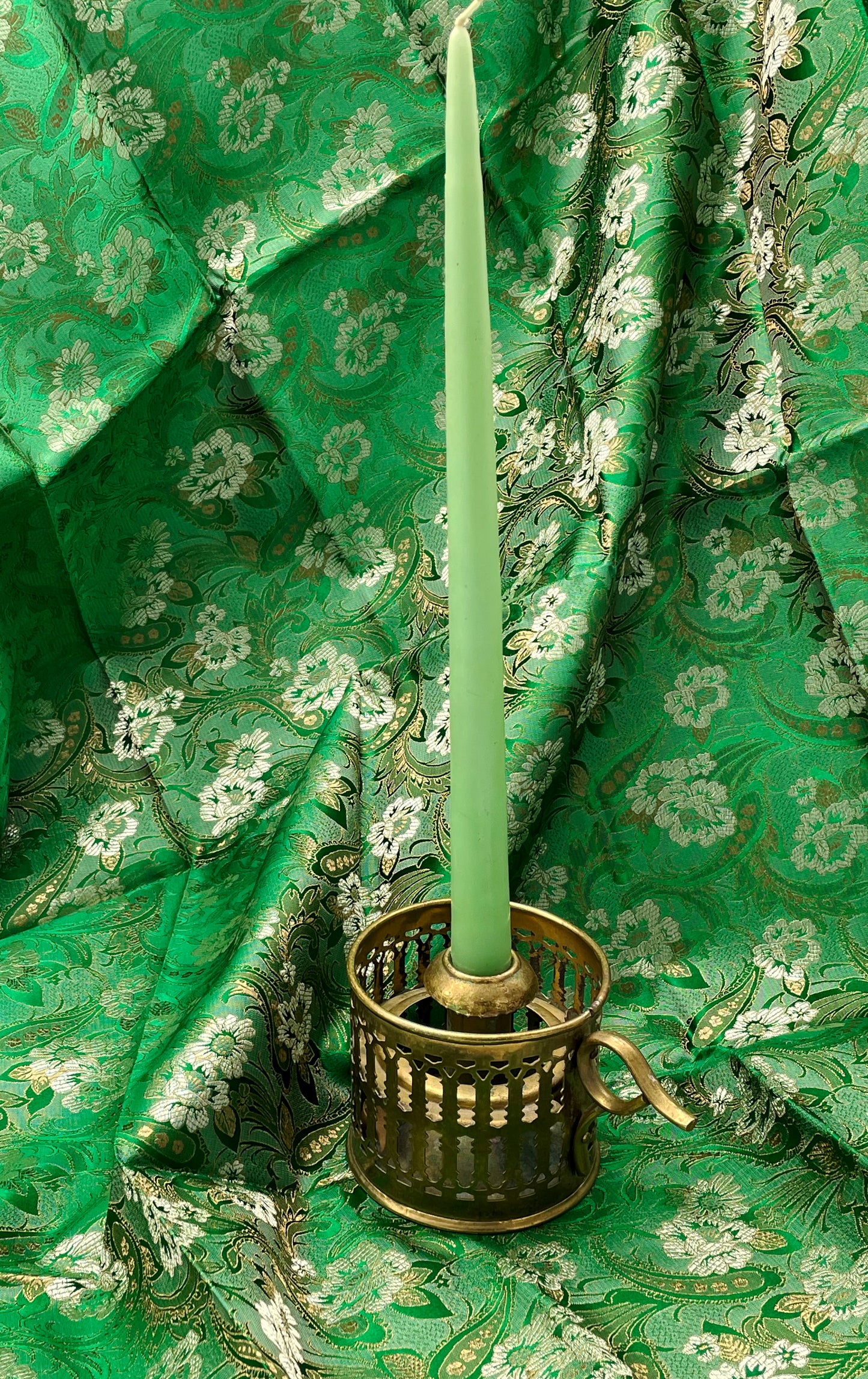 Brass portable candle holder openwork body