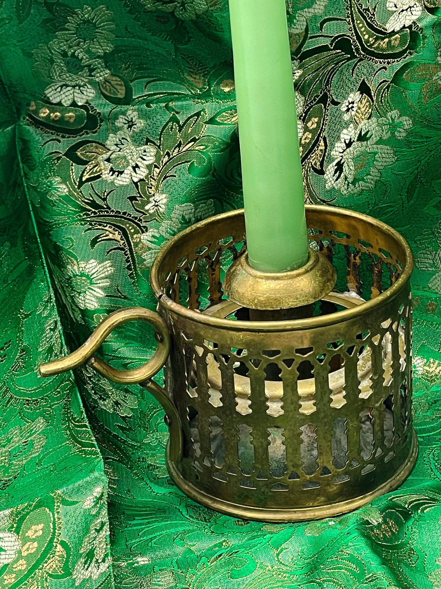 Patinated brass candle holder detail