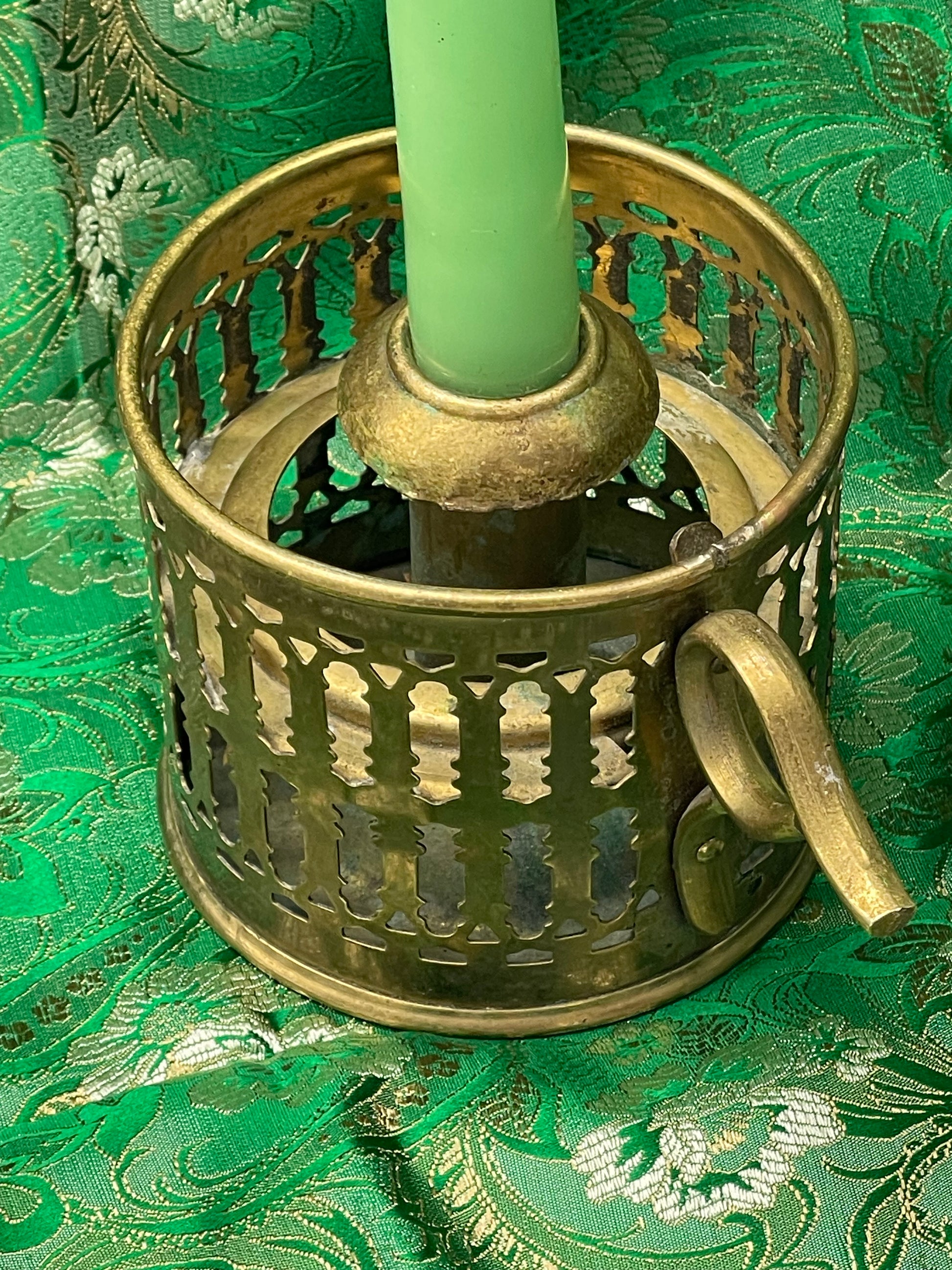 Pierced lattice brass chamberstick side