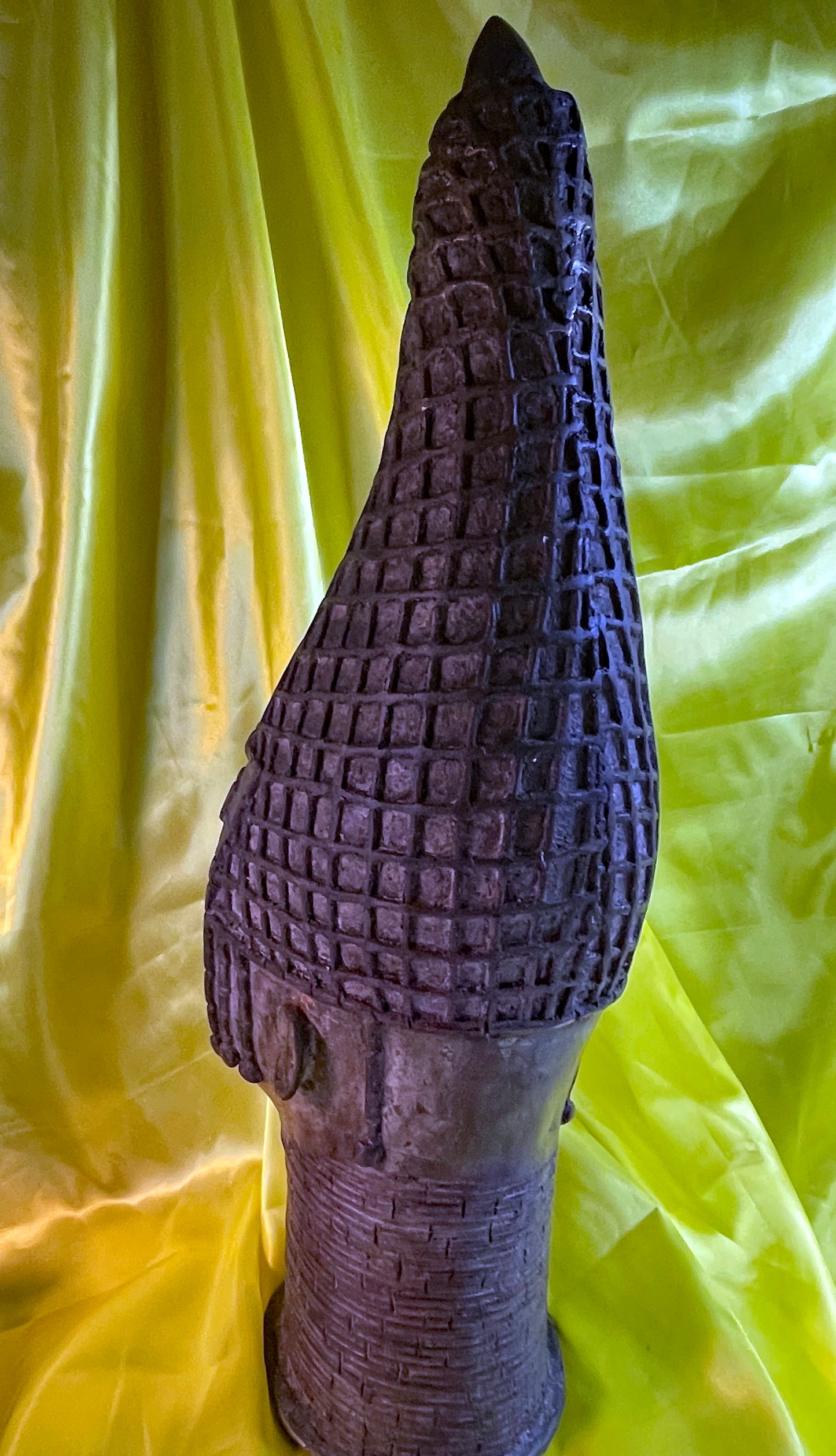 Rear view of the Benin bronze head showing the full peaked crown