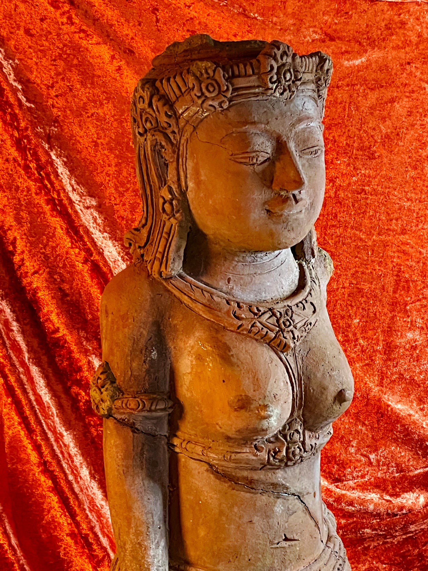 Antique terracotta temple figure goddess torso with carved diadem