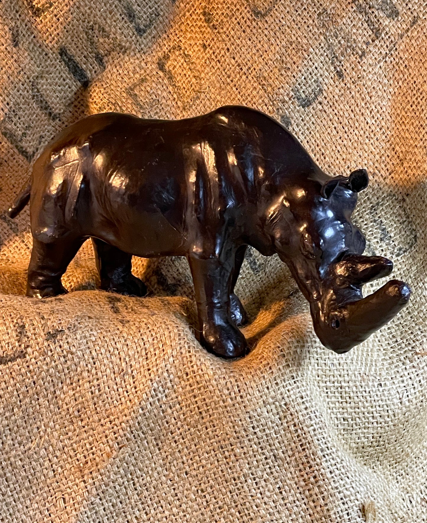 Vintage Italian black leather rhinoceros sculpture with double horn, side profile