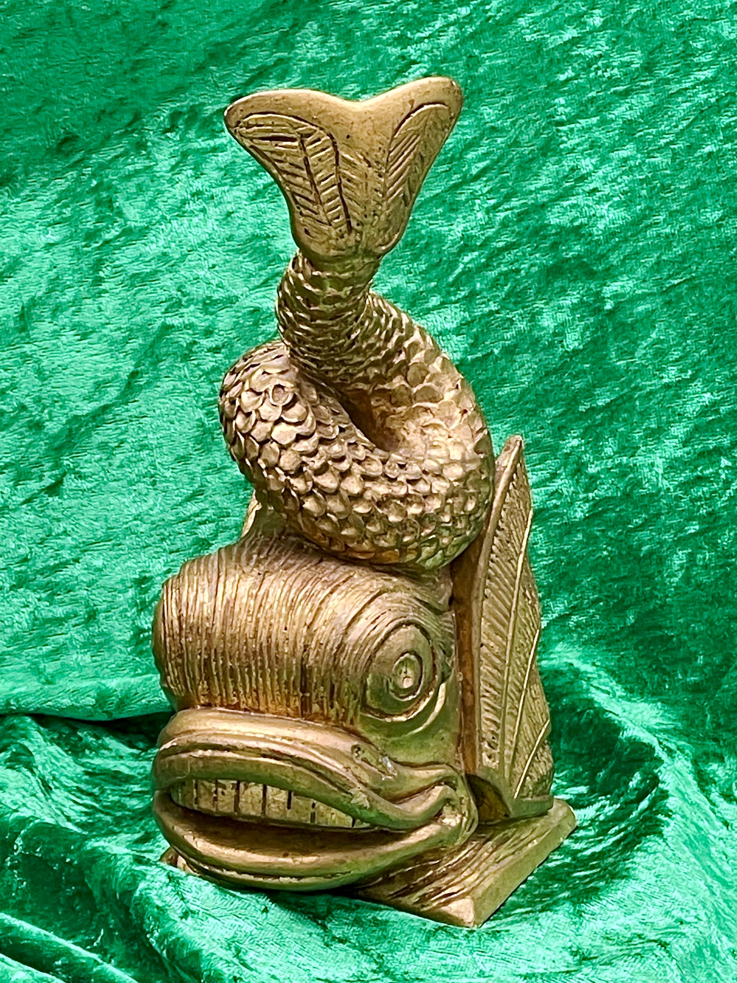 Detail of carved scales on golden fish figure