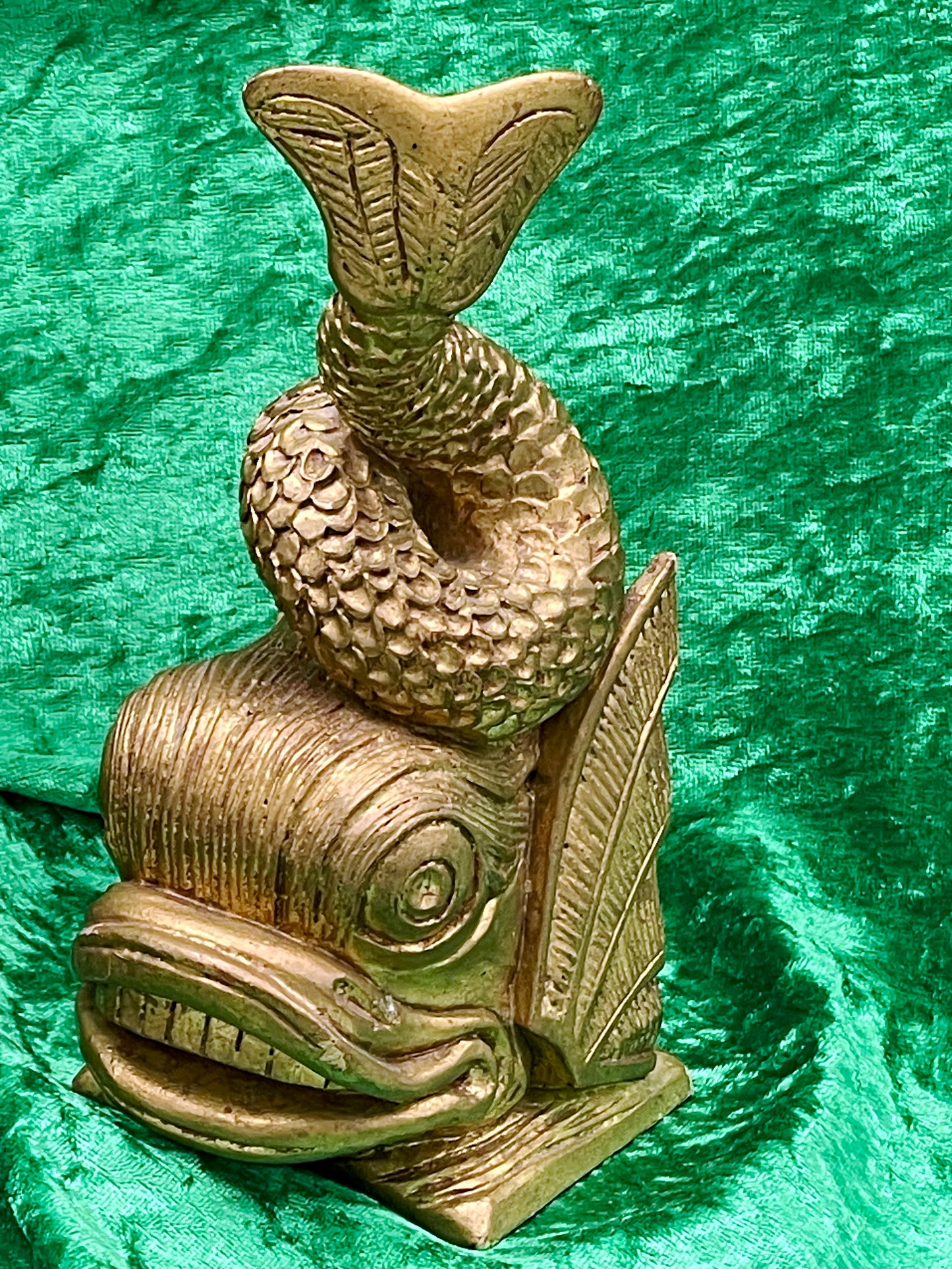 Close-up of expressive carved fish face