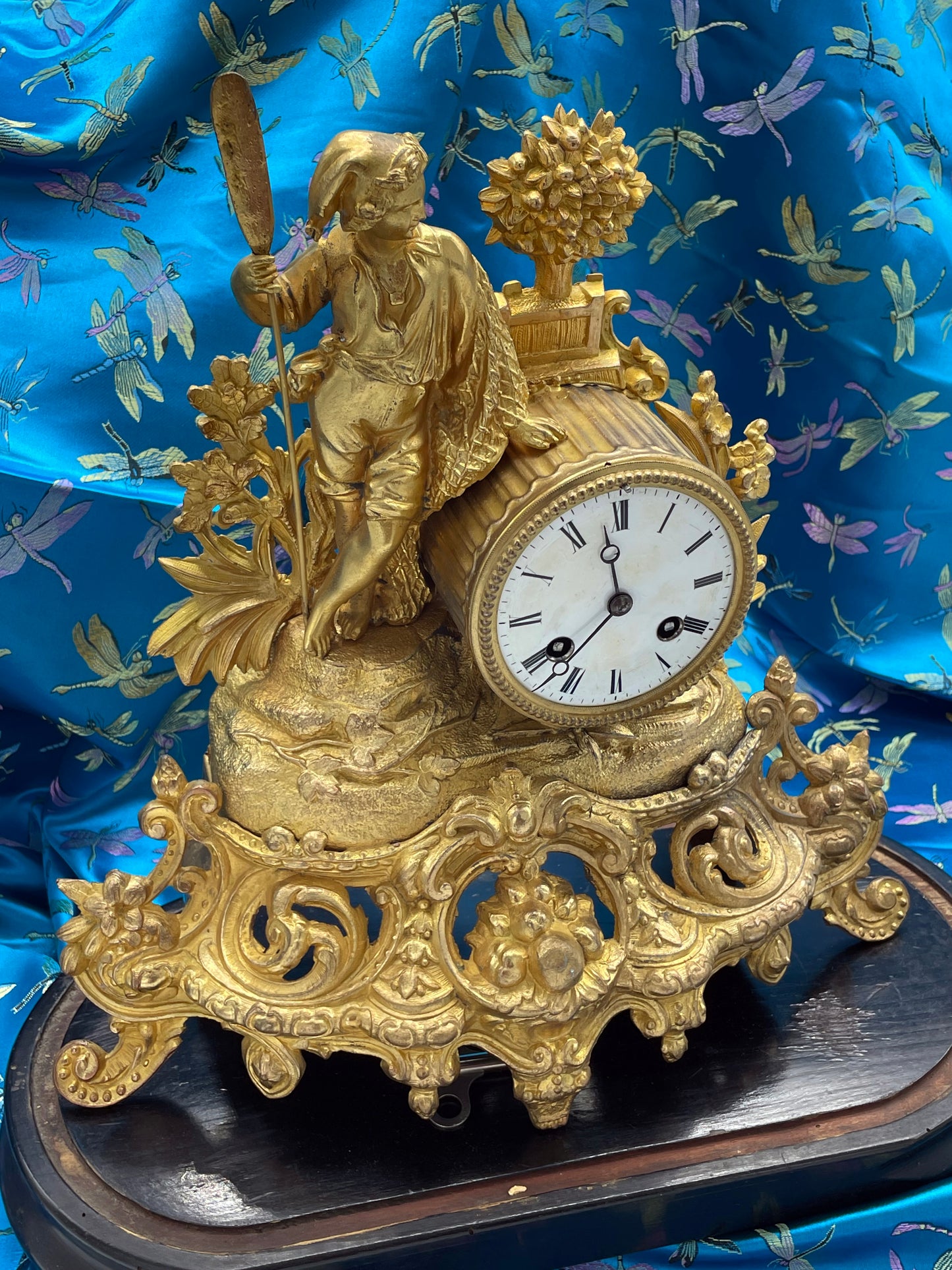 Detail of gilt bronze figural mantel clock