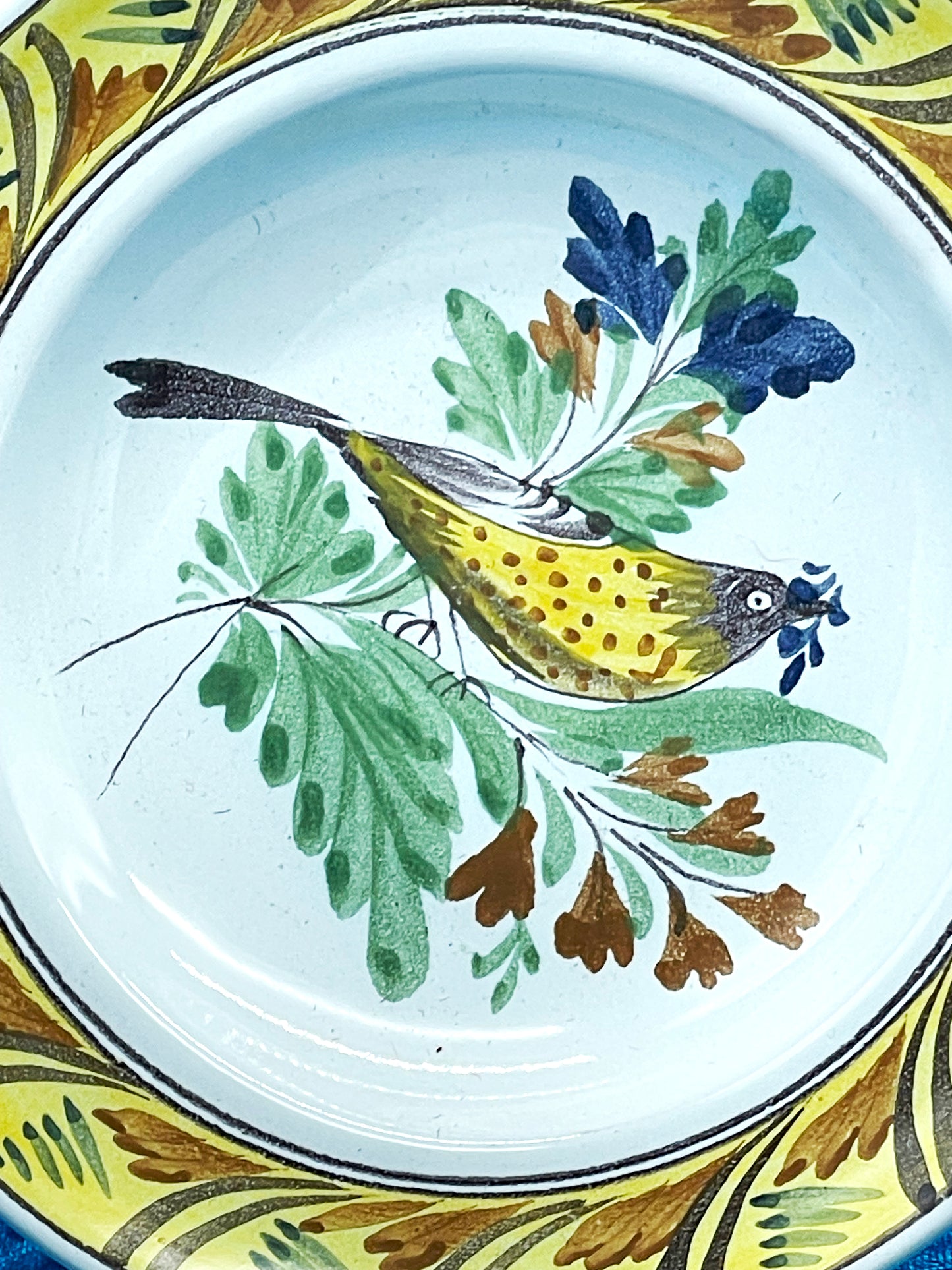 Hand-painted German faience plate with folk floral decoration