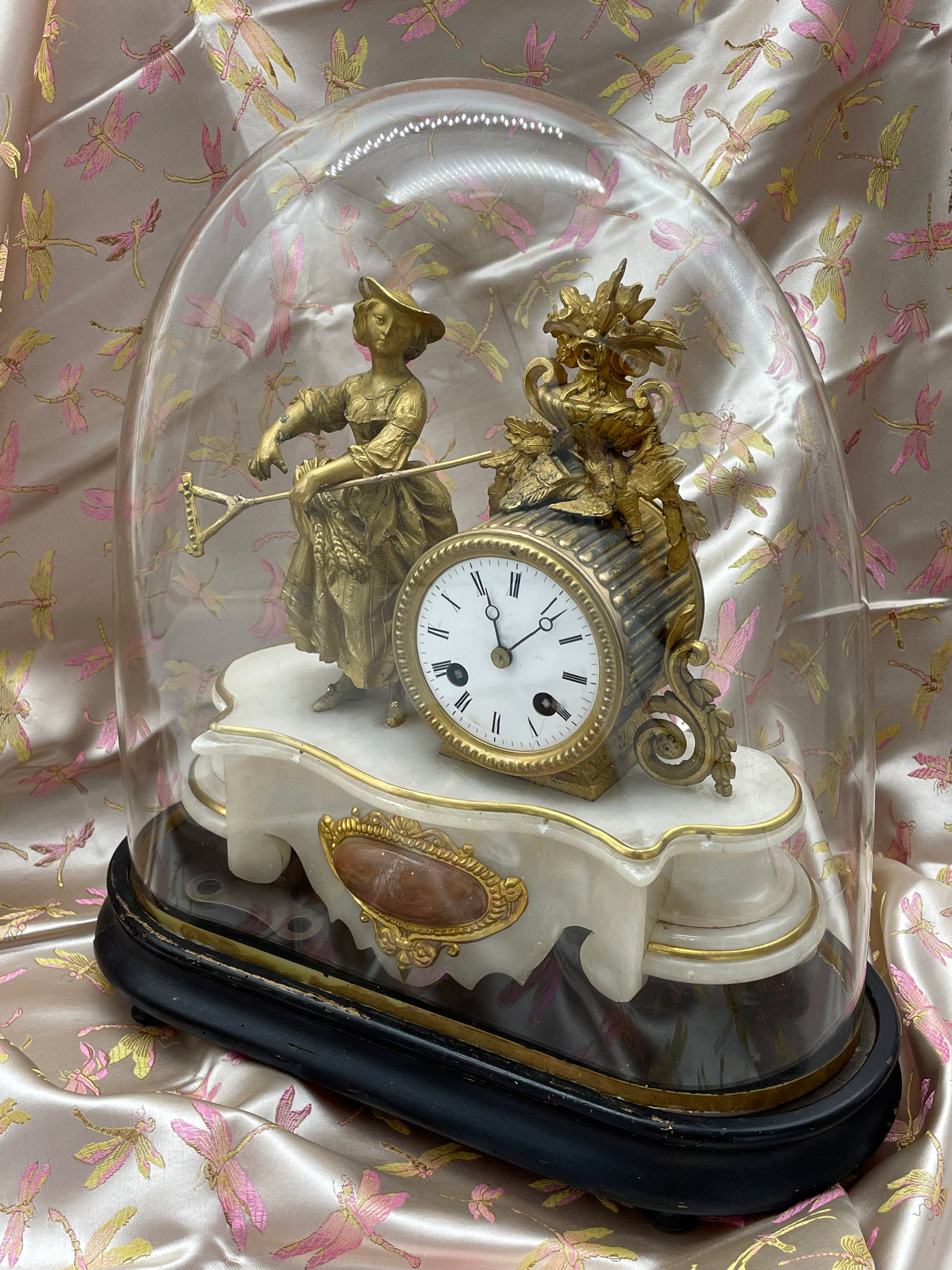 French pendule mantel clock under glass dome with marble base and ormolu lady figure