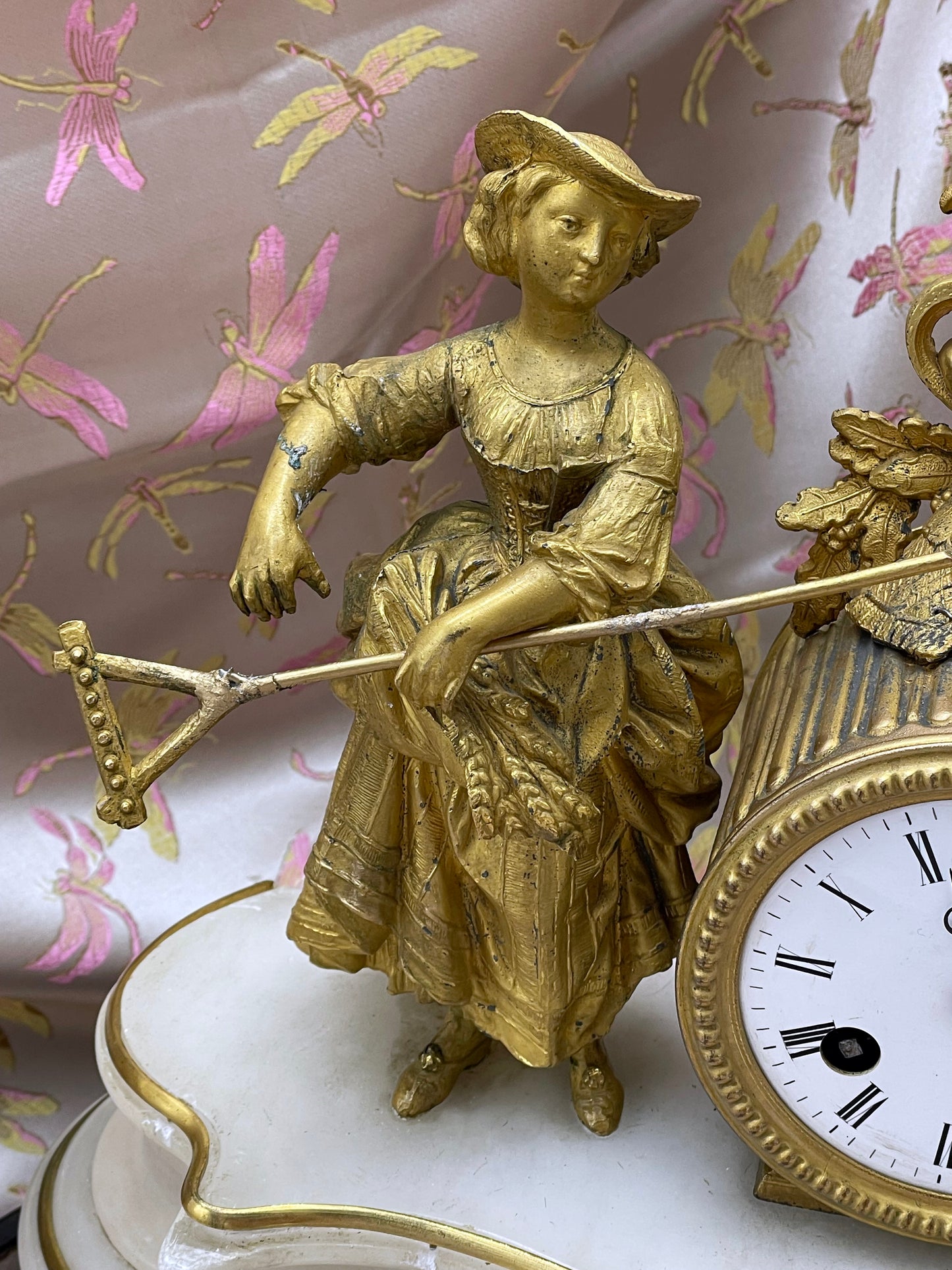 Gilt bronze figural detail of the 19th century French clock