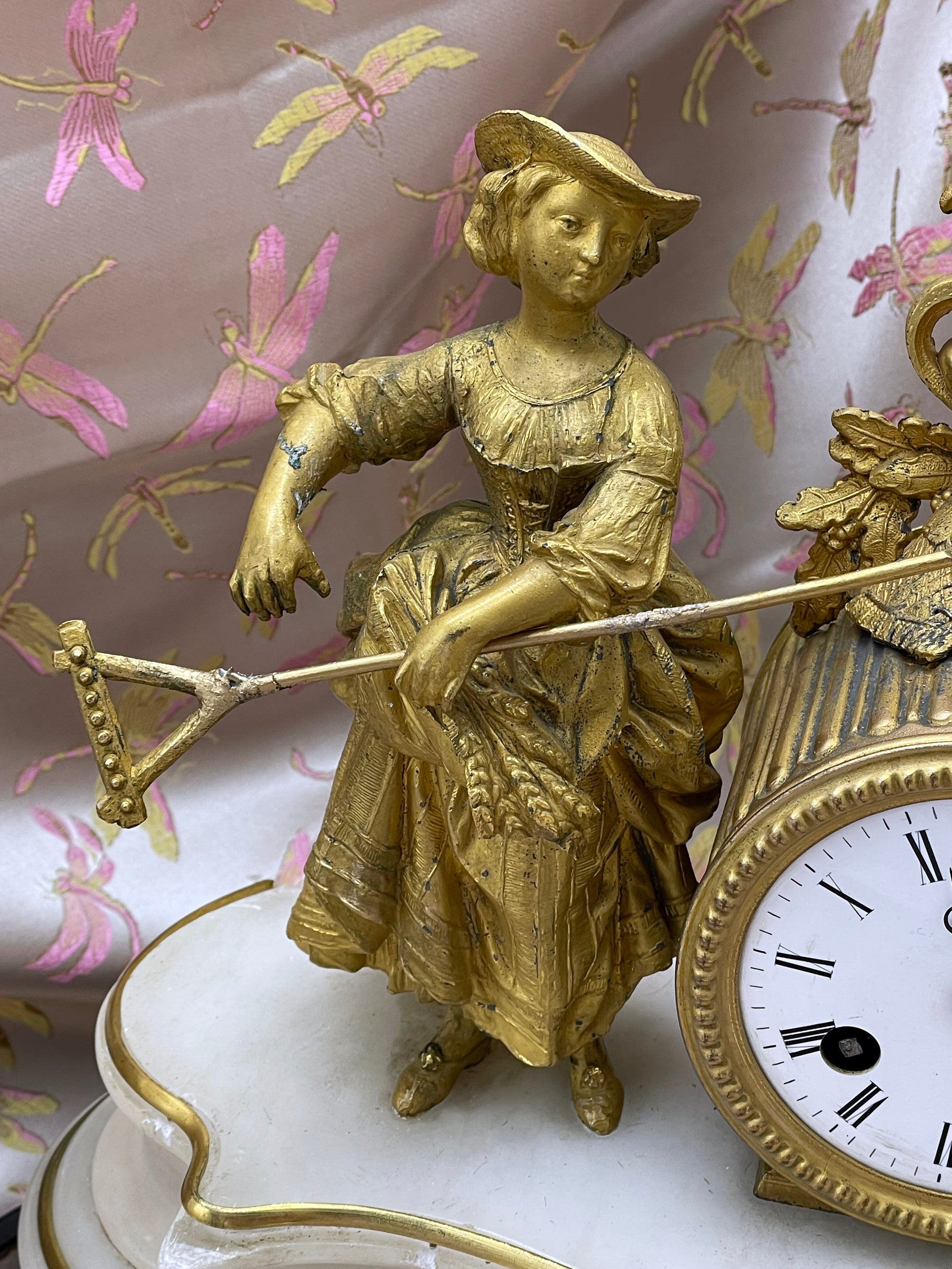 Gilt bronze figural detail of the 19th century French clock