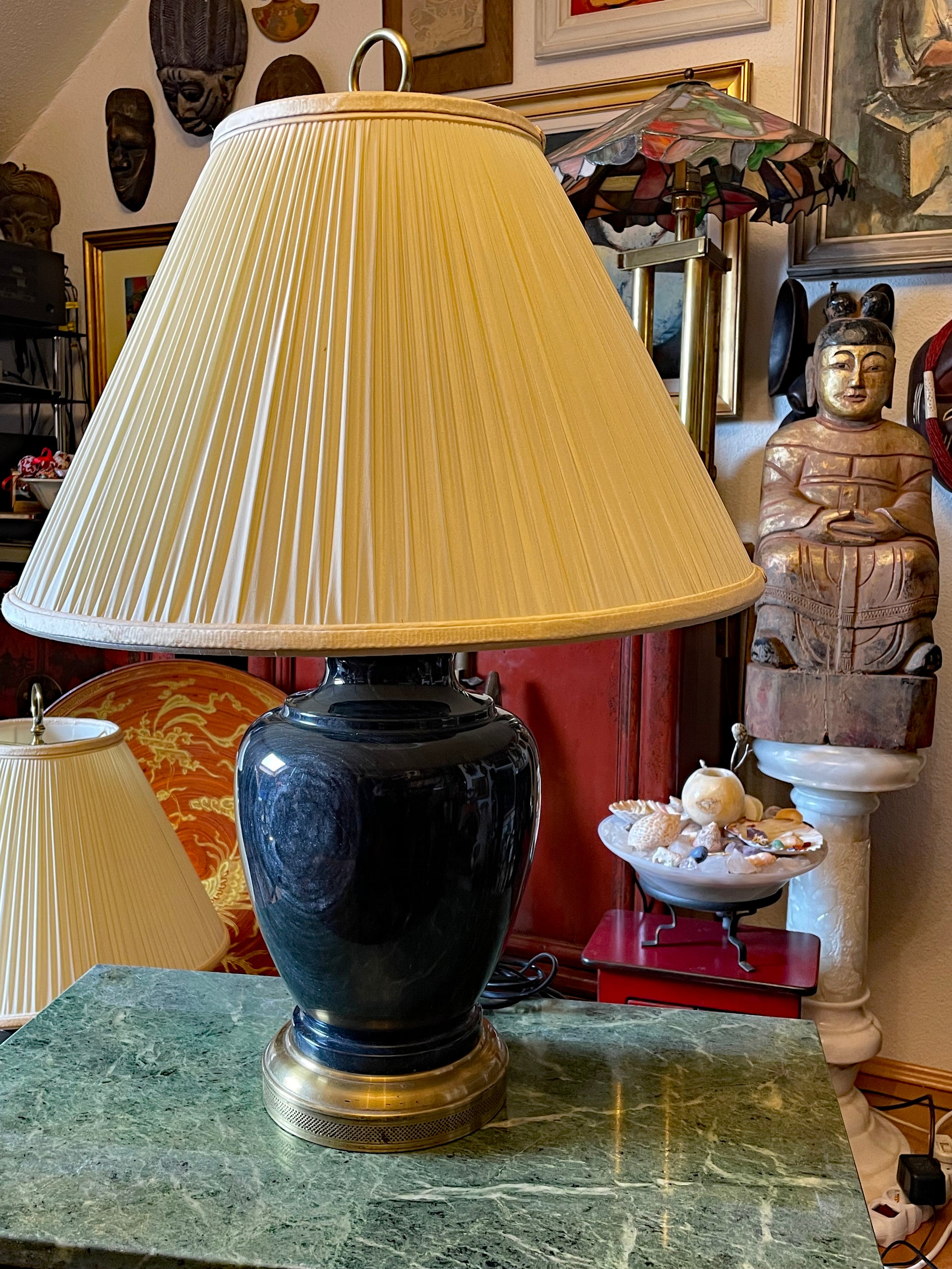 Designer marble lamp detail with brass shade holder