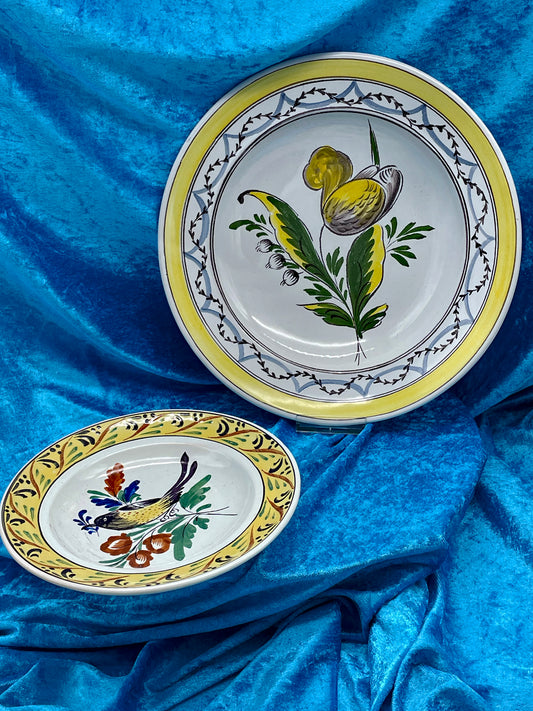 Two hand-painted Kellinghusen Trenck faience plates with tulip and bird motifs