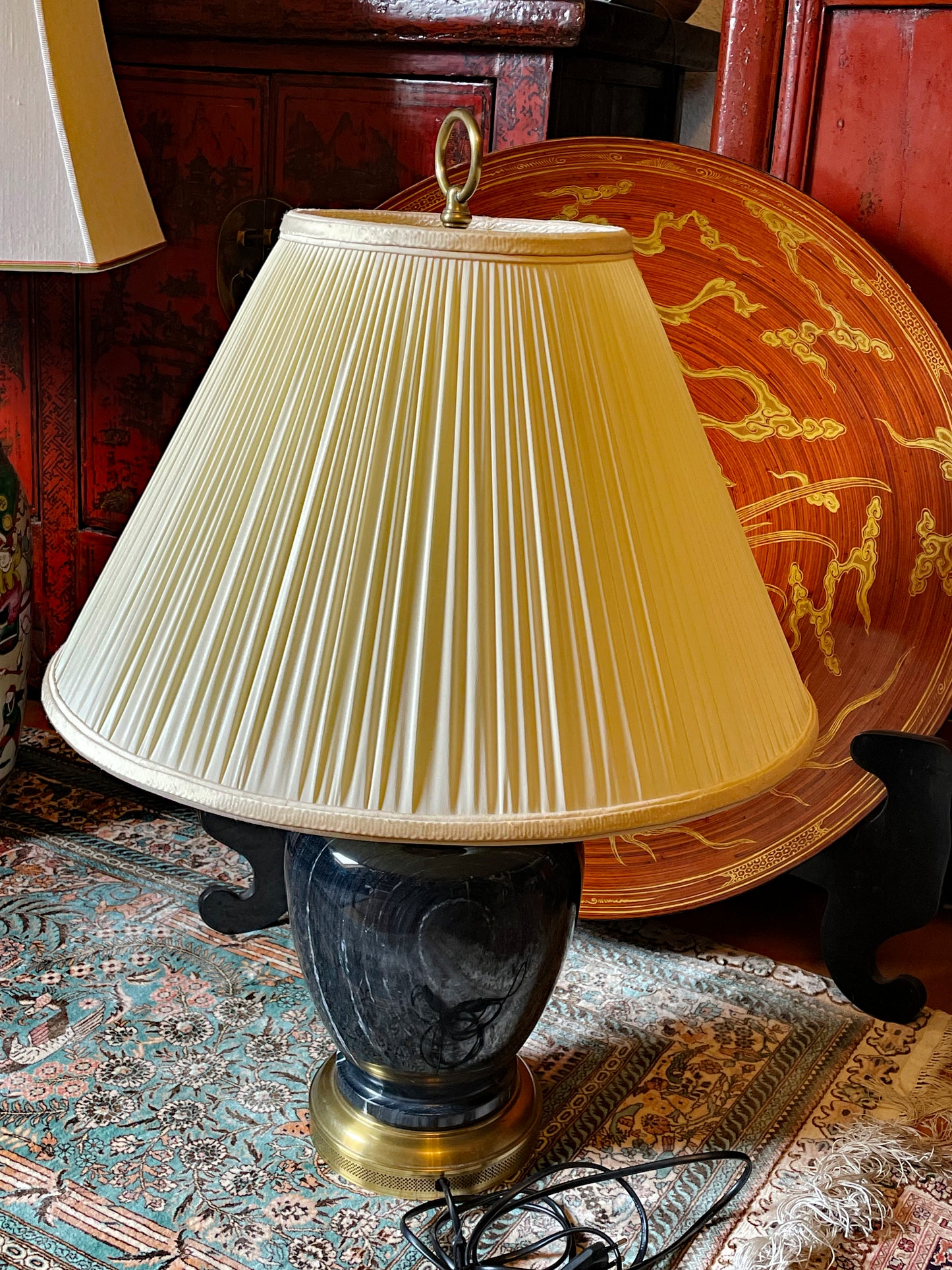 Brass base detail of marble designer lamp