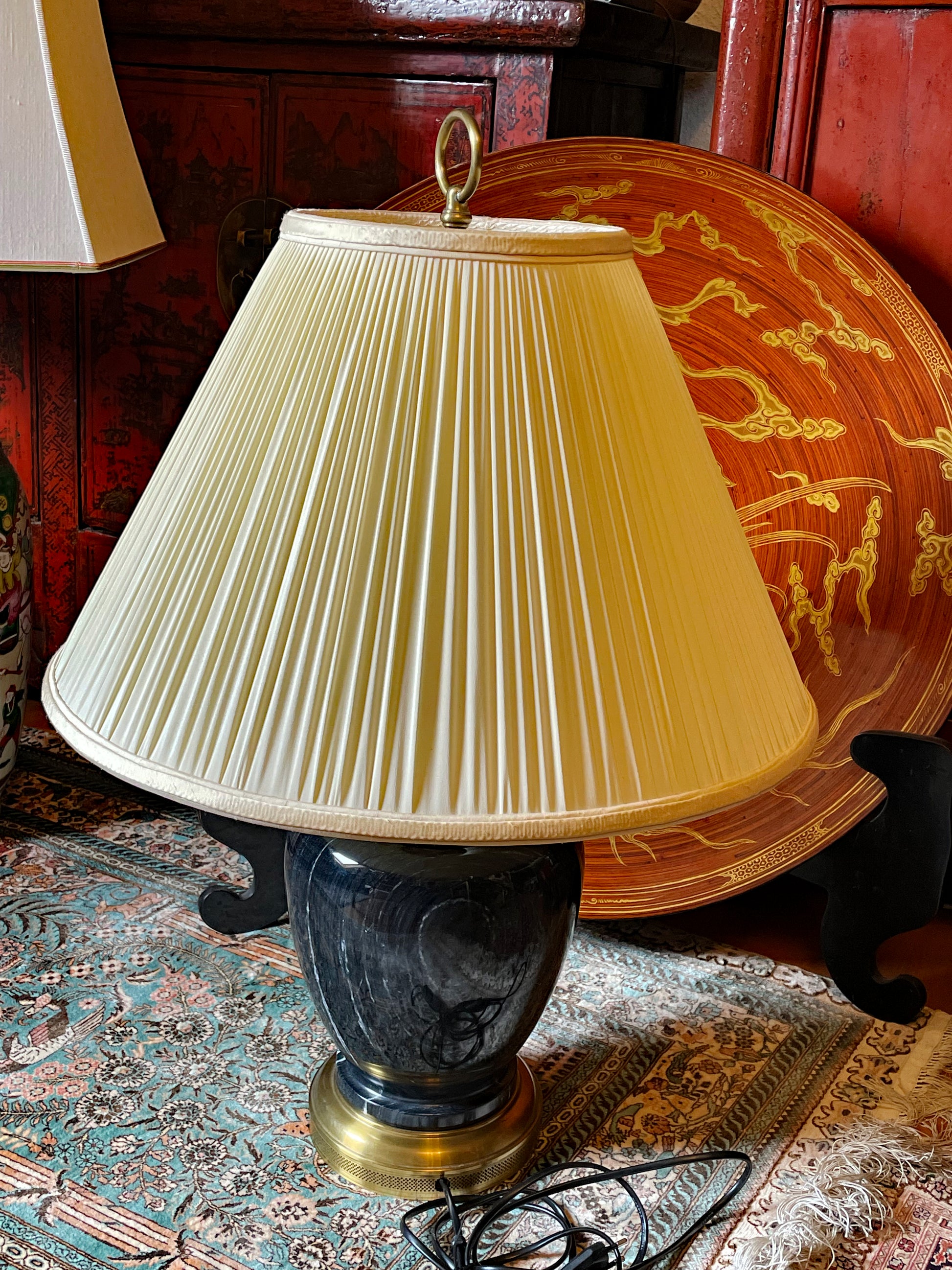 Brass base detail of marble designer lamp