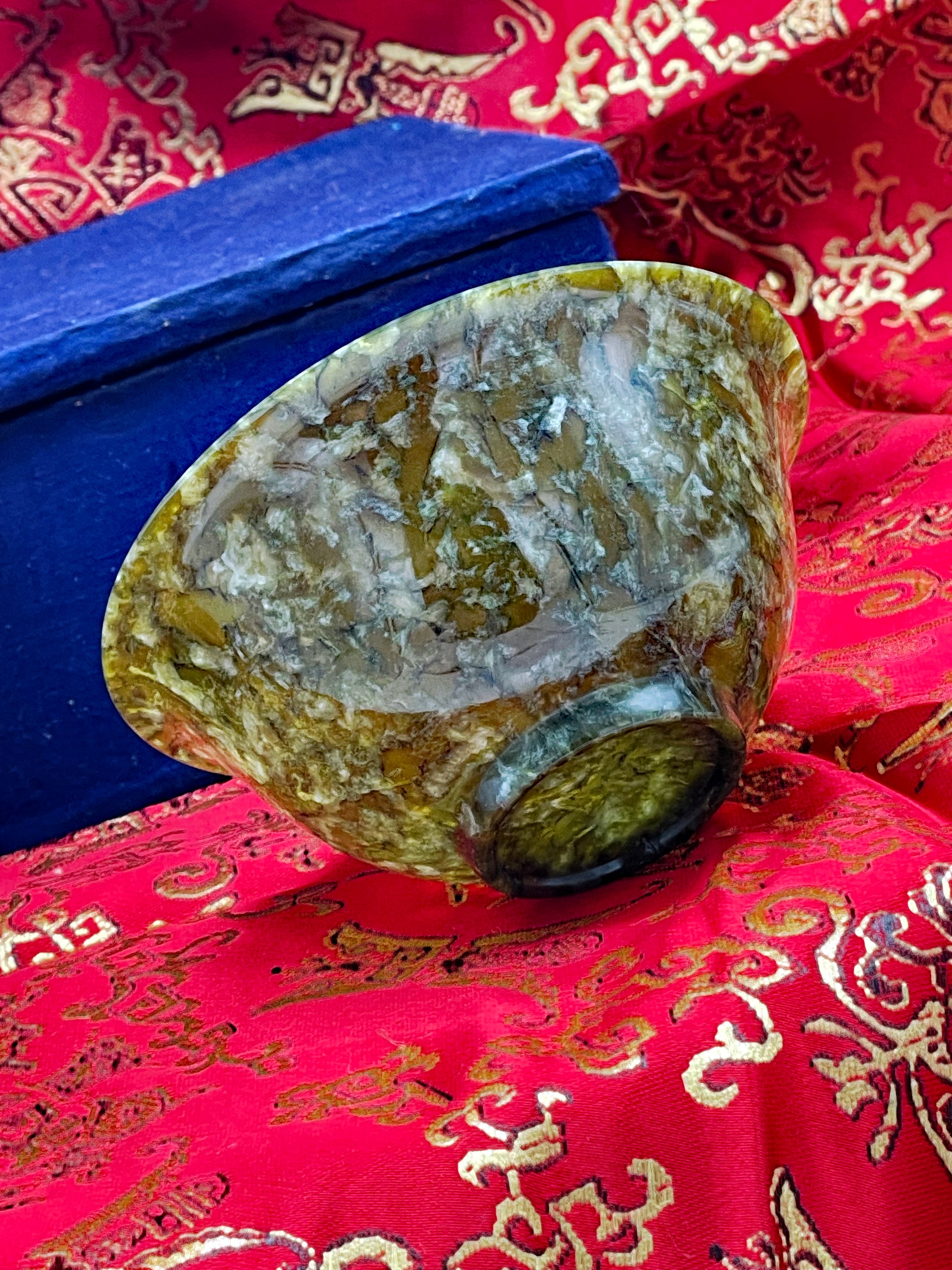 Translucent jade bowl held to the light