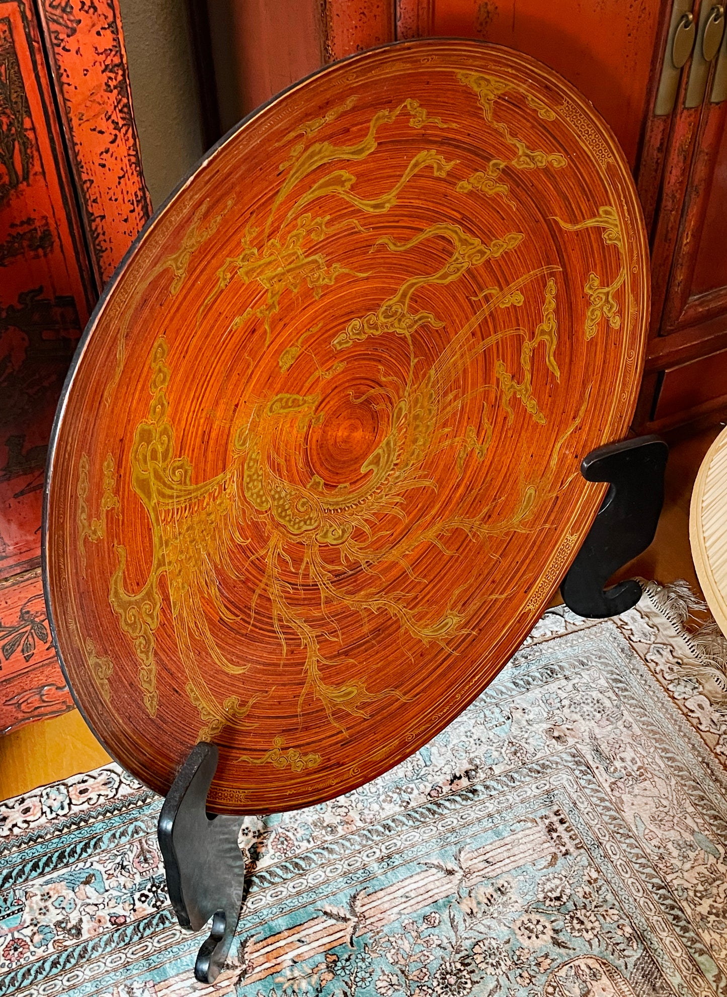 Chinese gold dragon lacquer plate detail of gilded scales and trailing wisps