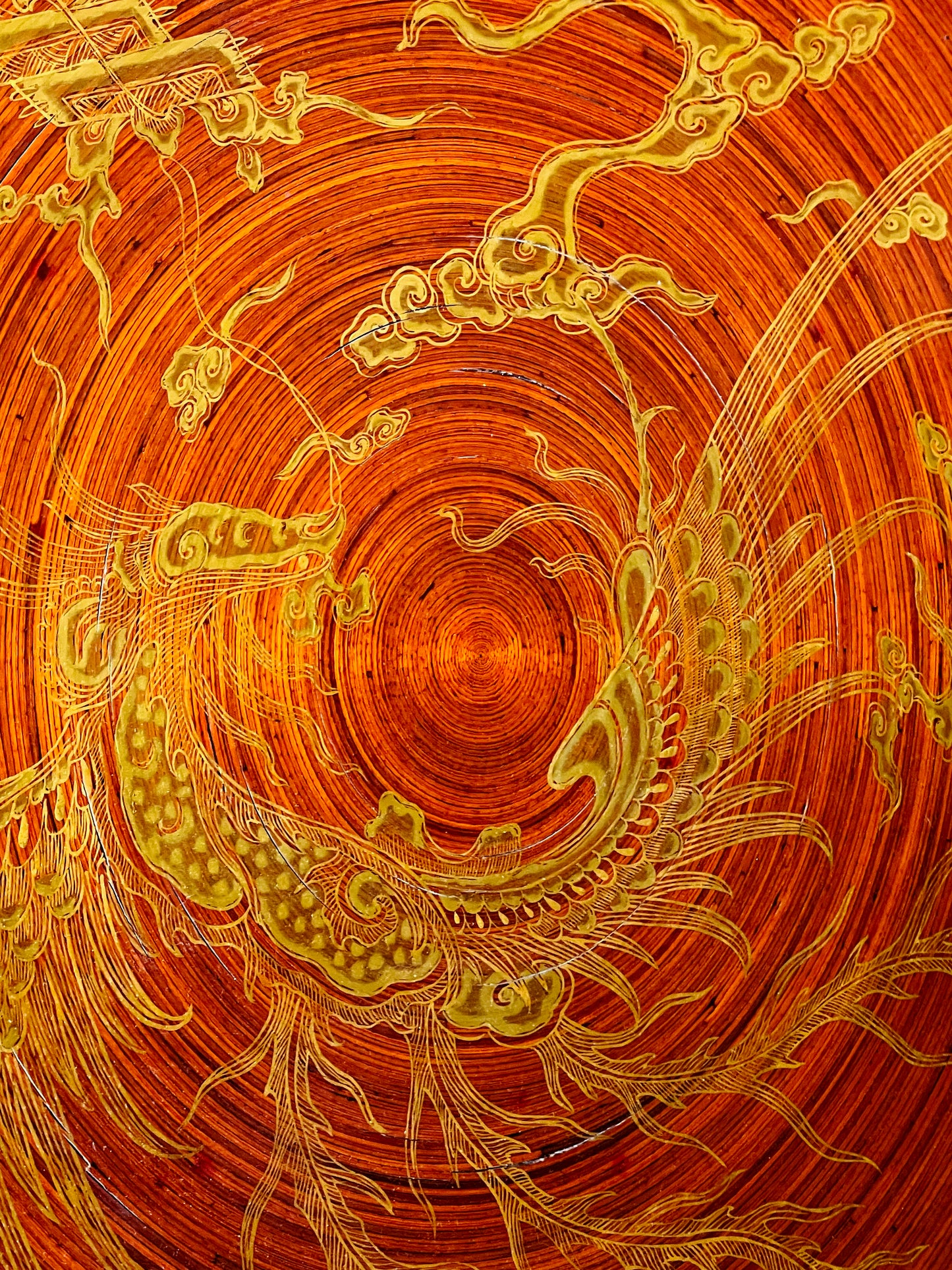 Oversize Chinese lacquer charger with filigree gold dragon and clouds on cinnabar-red coiled ground