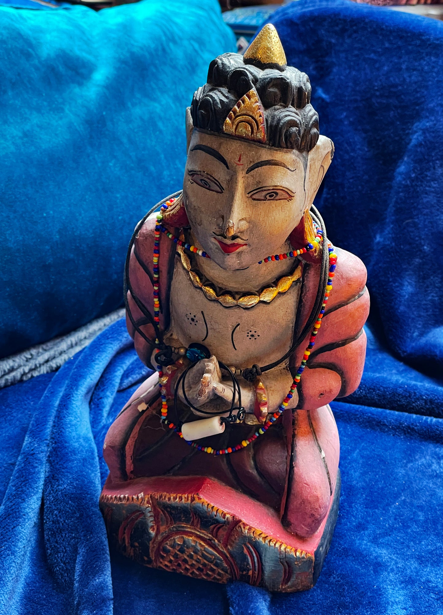 Vintage Indian carved painted wooden praying figure, front view