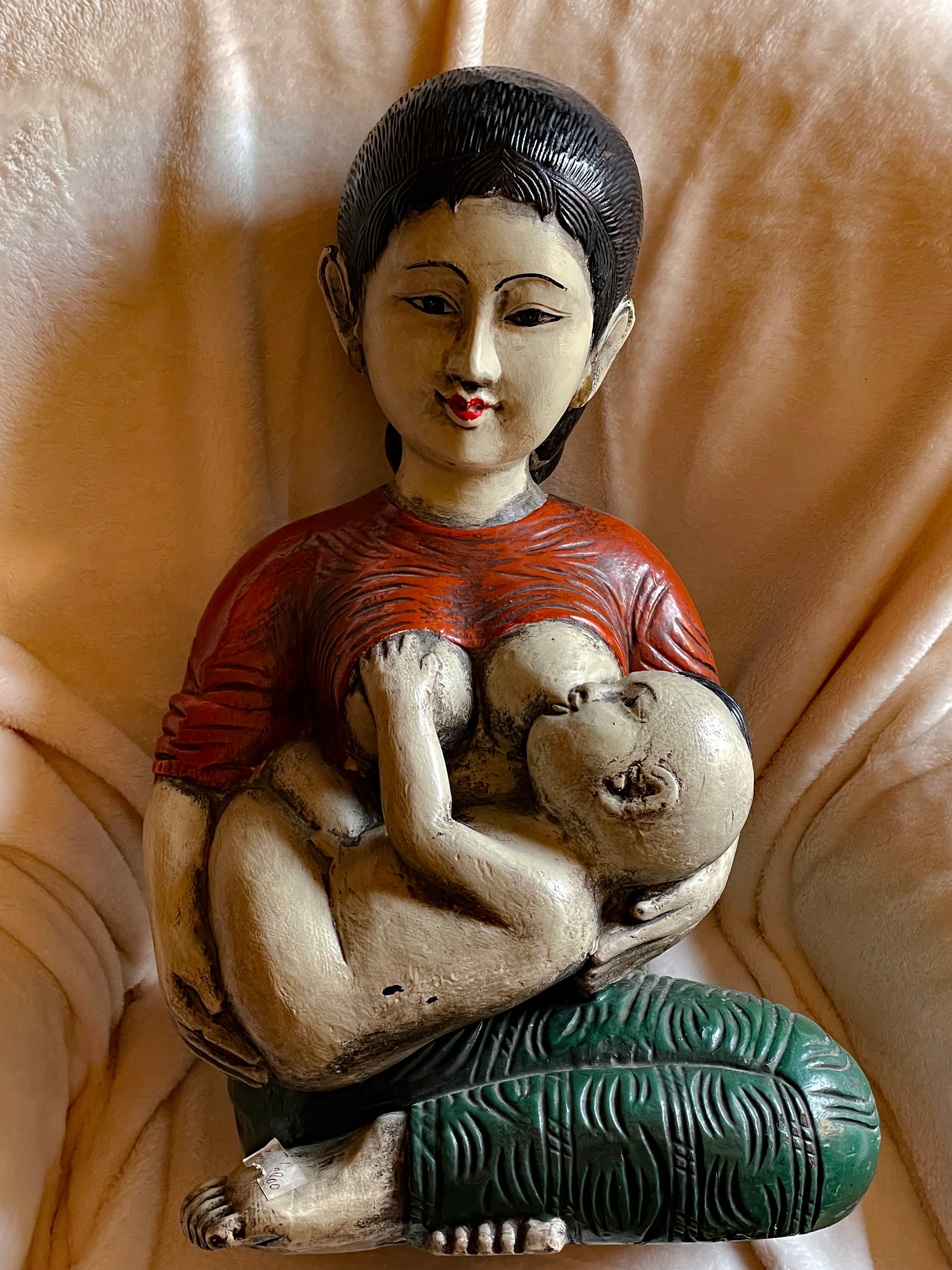 Mother nursing child wooden folk-art figure, Japan